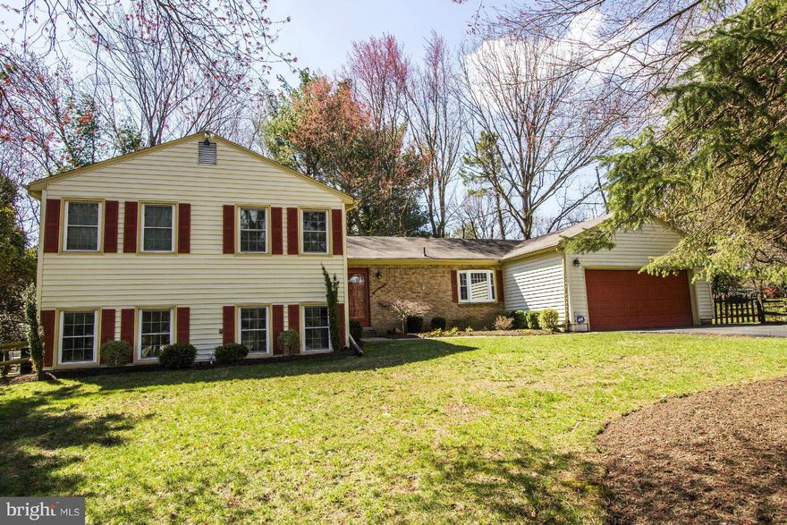 Beautiful SFH in the quiet Cinnamon Creek neighborhood. Two patio's & sunroom on a landscaped .47 acre lot & surrounded by mature trees. 4BR/3BA, 2 car garage, & 1 wood burning FP. Over 3,000 sqft of living space w/ lots of natural light. HW flooring t-out the home. Updated baths & KIT w/granite, custom cabinets. FR w/wet bar. Lots of storage.Great location close to parks, metro, commuter routes.