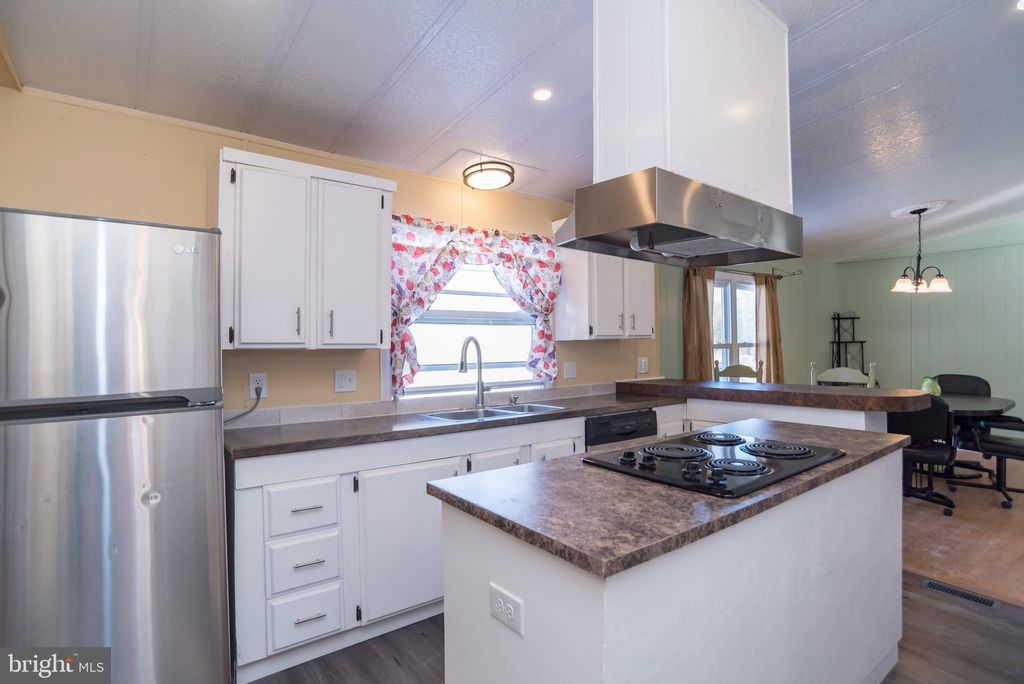 Photo of 7016 Huber Drive, MORRISVILLE, PA 19067 (MLS # PABU2114154)