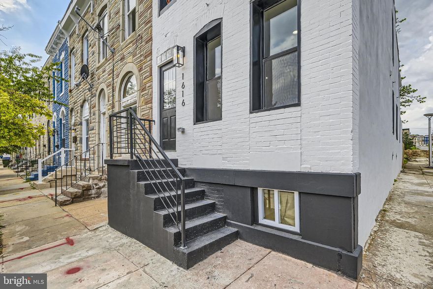 Welcome Home! Don’t miss out on the rare opportunity to own this Wonderful end unit Row-home with 3 bedrooms and 3.5 baths in Oliver Community! The first floor is complete with an open concept, living room with built-in fireplace, new kitchen featuring high end appliances, Quartz countertops, coffered ceilings, and recessed lighting. As you make your way to the second level you’ll notice custom rod iron hand rails throughout. The upper level features a fantastic primary suite as well as 2 more bedrooms and a full bath. Additionally this beauty offers a finished lower level with spacious rec area and conveniently place full bathroom. But the updates do not stop here. There is also a fenced rear patio for your privacy and entertainment. What also makes this home unique is that it is eligible for a $10,000 grant from Vacants to value as well as a Johns Hopkins $17,000 live near your work incentive. Don’t miss out on the opportunity to own this wonderfully stylish row home. Schedule your tour today!