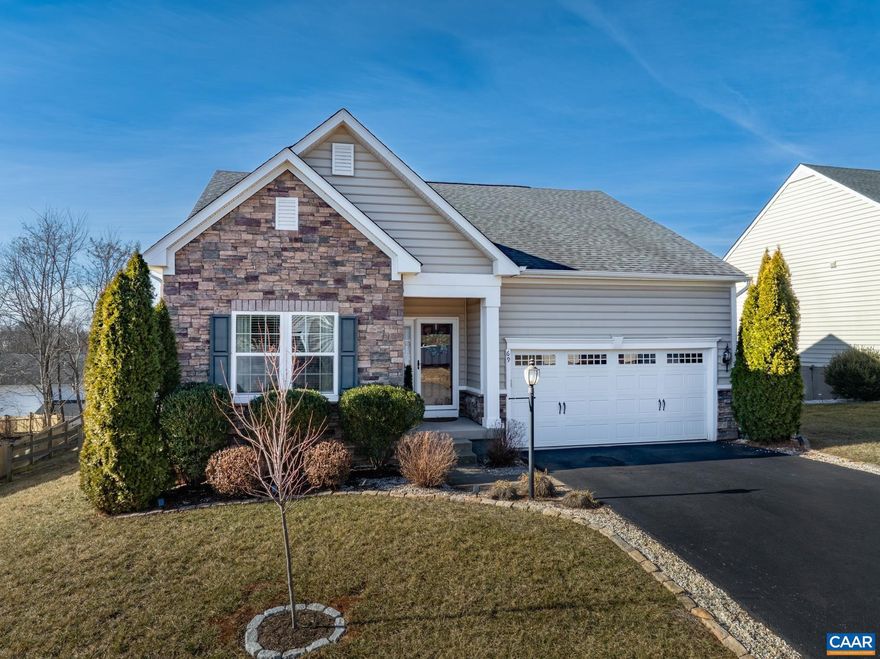 Just listed ? an upgraded Greencroft gem near NGIC/DIA! This one-level home offers open-concept living, a main-level Owner?s Suite, and over $82K in upgrades, including a 4 ft. extension. Better than new, with a fenced yard and beautiful mountain views. The bright main level features a large foyer that flows into the kitchen, great room, and sunroom, with a walkout to the Trex deck. The Owner?s Suite includes a spacious King bedroom, dual-vanity bath, frameless glass shower, dual shower heads and custom tilework. A guest bedroom, full bath, and study with French doors complete the main floor. The finished lower level adds a second Master Suite, full bath, and a large great room with French doors leading to the fenced backyard?ideal for guests or multigenerational living. The gourmet kitchen includes a 48" island, upgraded cabinetry, granite, backsplash, and hardwood floors. The great room features 9 ft. ceilings, stone gas fireplace, in-ceiling speakers, and wiring for a wall-mounted TV. Energy-efficient LED lighting, a programmable thermostat, and an outdoor water meter add convenience and savings.  A light-filled, beautifully upgraded home with outstanding mountain views.,Granite Counter,Fireplace in Living Room