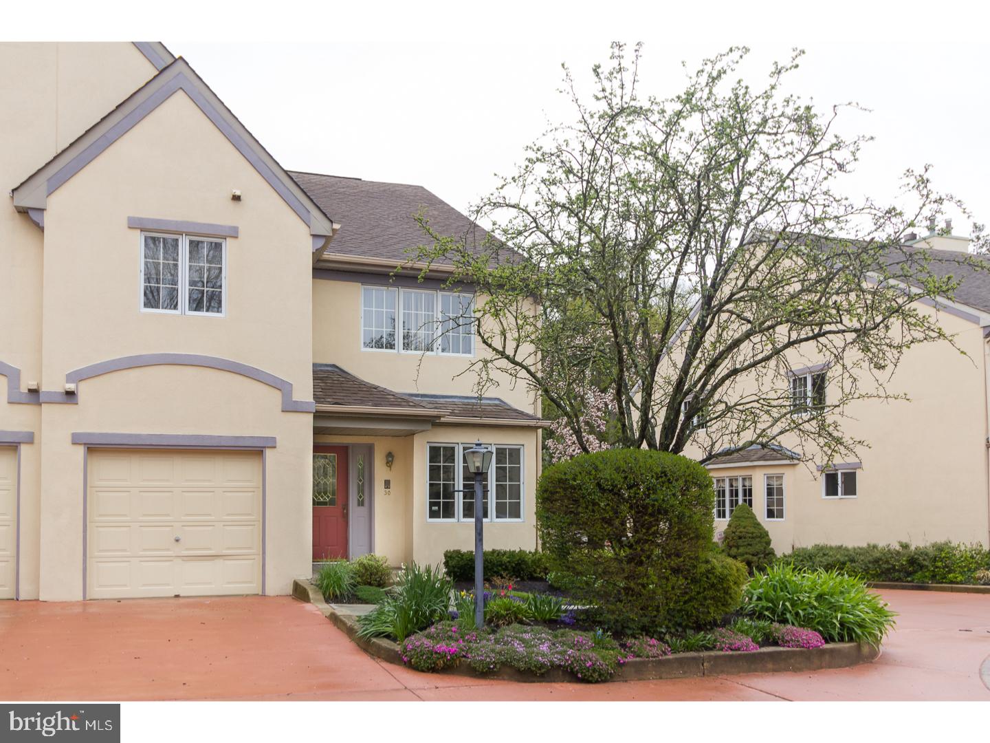 Fantastic neutrally updated townhome that you don't want to miss! Beautiful 3 Bed/3.5 bath corner unit in the gated community of the Court at St. Asaph's in Bala Cynwyd. Warmth can be felt the moment you walk into the tiled entrance foyer. The spacious Kitchen and Breakfast Room with brand new quartz countertops offer abundant cabinet space, peninsula, 2 pantry closets, self-cleaning oven, built in microwave, trash compactor and recessed light. Light streams through the dramatic 2 story Living Room with hardwood flooring and beautiful fireplace with marble surround and wood mantel. The formal Dining Room with hardwood flooring and a wall of windows opens into the Living Room. Directly adjacent, relax in the carpeted cozy Den. Additionally you will find the Powder Room and 1 car attached garage. The 2nd floor offers the Master Bedroom Suite, 2nd Bedroom and loft like area overlooking the Living Room. Open double doors into the Master Bedroom to find two large walk-in closets, dressing area and linen closet. The Master Bathroom features split bath with double sink vanity, jetted tub, bidet and shower. The spacious 2nd Bedroom offers a nice sized closet and adjoining Bathroom with vanity and linen closet that also can be accessed from the hall. Laundry closet with upper cabinets and wall to wall carpeting complete the 2nd level. The Finished Lower Level features a carpeted Family Room with French door to patio, perfect for setting up a grill. The carpeted bonus 3rd Bedroom offers a large closet and recessed lighting. In addition, a Bathroom with vanity and tiled sink and storage room with utilities can be found. Condo fee includes landscaping, snow and trash removal, water, exterior maintenance, parking. This private enclave of homes is steps away from restaurants, shops, major highways and 15 minutes to Center City. Award winning Lower Merion School District. Brand new carpeting throughout and brand new Kitchen quartz countertops!