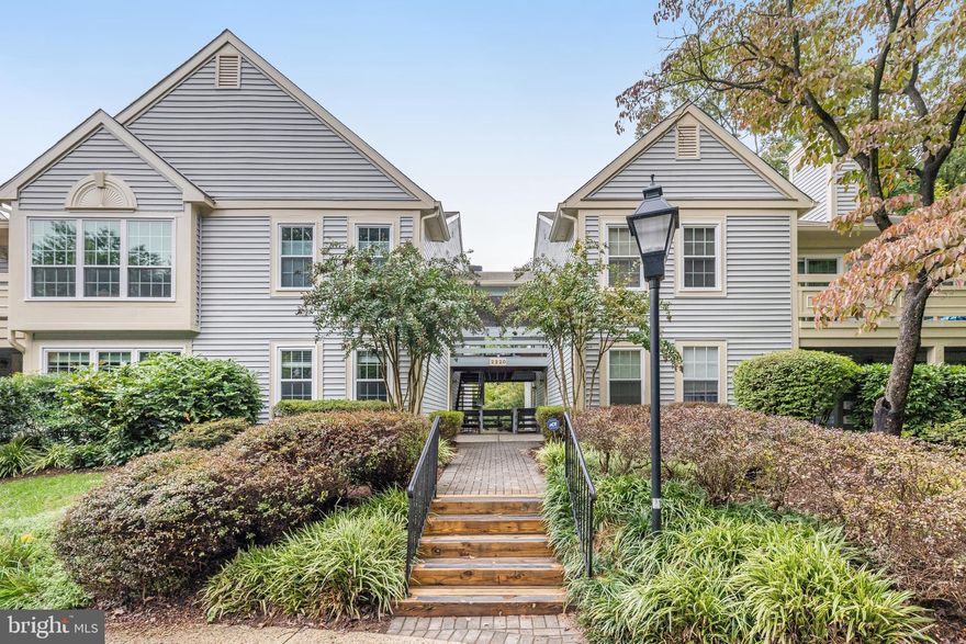 **Charcuterie cups catered Open House this Friday (11/8) 4-6pm &  Saturday (11/9) 12-2pm and Pizza and Pop Food Truck on  Sunday (11/10) 2-4pm** Step into a world of warmth and character in this stunning 2-bedroom, 2-bath condo with a loft, nestled within the vibrant Bristol House community of Reston. This isn’t just a home; it’s a lively space where charm meets comfortable living. As the largest unit in the complex, this Wickford model offers a delightful blend of spaciousness and unique features that will captivate you.

As you enter from the foyer, you’re welcomed by a generous vaulted-ceiling family room, a cozy dining area, and an inviting kitchen that seamlessly connects, creating a harmonious and welcoming atmosphere. One of the standout features is the beautiful two-sided fireplace, connecting the family room to the primary bedroom, infusing both spaces with warmth and character. Imagine relaxing evenings by the fire, its flickering light adding an inviting glow to your living space.

The kitchen is equipped with essential appliances, including a refrigerator and dishwasher, both replaced in 2020, ensuring you have everything you need for everyday living. A brand-new microwave was added in 2024, making meal prep a breeze. The unit also includes a washer and dryer, replaced in 2020, providing convenience and ease for laundry days.

Off the family room, a bright sunroom beckons, its windows letting in ample natural light. This serene space leads directly onto a private deck, where you can enjoy peaceful views of the surrounding trees. The deck also connects to the primary bedroom, offering a tranquil outdoor retreat just steps from your cozy sanctuary.

The primary bedroom is designed for comfort, featuring direct access to the fireplace, a full en-suite bath, sliding glass doors with direct access to the balcony and a spacious walk-in closet—perfect for keeping your belongings organized. Across the home, the second bedroom also boasts a walk-in closet and convenient access to a dual-entry bathroom, providing privacy and ease for guests or additional residents.

Recent upgrades enhance the comfort and functionality of this home, including a new HVAC system installed in 2023 and newer windows and sliding glass doors, installed in 2014, ensuring energy efficiency and a bright, inviting atmosphere.

Venture upstairs to discover the versatile loft—an open space filled with possibilities. Whether you envision it as a cozy reading nook, a home office, or an additional entertainment area, the loft provides flexibility to suit your lifestyle.

Beyond your front door, Bristol House offers an exceptional lifestyle, with access to all of Reston’s renowned amenities, including scenic trails, community pools, and tennis courts. The vibrant Reston Town Center is just a short drive away, and commuting is convenient with the nearby Wiehle Metro station and Toll Road access.

This isn’t just a condo—it’s a home that offers the space to live, relax, and thrive in style. Experience it for yourself and let this Reston gem become your next beloved retreat!