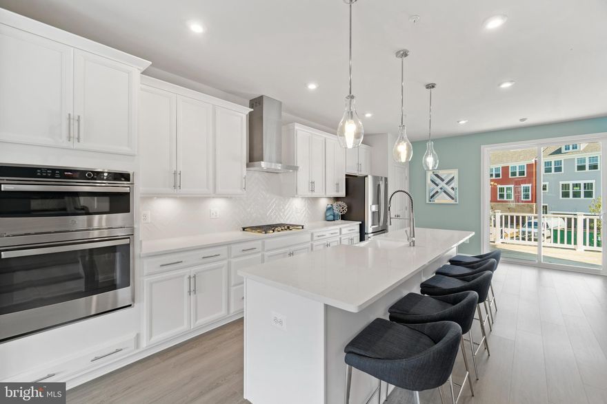 This multi-level home has everything the active family needs. The 2-car front load garage keeps you warm and dry as you load and unload your car from a quick trip to the grocery store on a stormy day. Also on the lower level is a recreation room with a convenient half bath. The main level great room with an expansive kitchen has space for large gatherings, including an attached deck for outdoor entertaining. Three bedrooms on the upper level provide a quiet place to go when it's time to rest. The largest bedroom, the primary suite, offers a large walk-in closet, bathroom with double sink, full bath, and enclosed toilet area. *Photos are of a similar home  Design selections have not yet been made for this home. The current price reflects the base price and structural options. 
*Photos are of a similar home.*