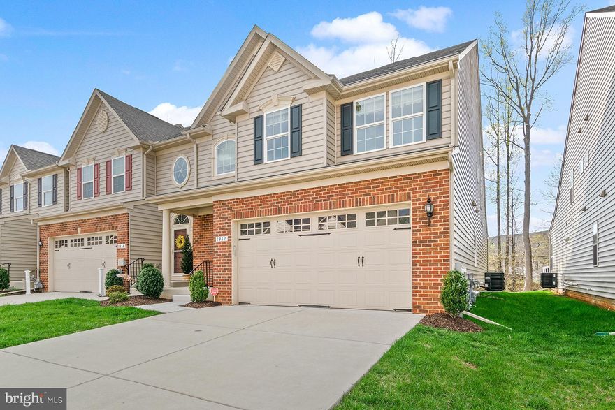 EVEN THE MOST DISCRIMINATING BUYER WILL APPRECIATE THIS LEVEL OF ELEGANCE AND ATTENTION TO DETAIL.   BARELY LIVED-IN LUXURY VILLA IN MINT CONDITION.  FEATURES EVERY SINGLE UPGRADE AND FEATURE OFFERED BY THE BUILDER.    MAIN LEVEL HAS WIDE PLANK HARDWOOD FLOORS, GOURMET KITCHEN WITH ISLAND, 42" CABINETS, GRANITE, STAINLESS APPLIANCES, UNDER CABINET LIGHTING & CERAMIC BACK SPLASH.  FIRST FLOOR LAUNDRY AND HALF BATH.  OPEN CONCEPT LIVING ROOM AND DINING ROOM WITH OVERLOOK FROM SECOND FLOOR LOFT.  SPACIOUS FIRST FLOOR OWNER'S SUITE WITH LARGE WALK-IN CLOSET.  LUXURY BATH WITH CUSTOM CERAMIC SHOWER AND DOUBLE VANITY.   PATIO DOORS TO COMPOSITE REAR DECK WITH RETRACTABLE AWNING AND STEPS TO PAVER PATIO AND REAR YARD.  LOT IS PRIVATE AND BACKS TO COMMON AREA.  FULLY FINISHED LOWER LEVEL WITH FULL BATH, REC ROOM, WET BAR & GENEROUS STORAGE AREA.  SECOND FLOOR FEATURES LOFT SITTING ROOM , THREE ADJOINING BEDROOMS AND FULL BATHROOM. ALL BATHROOMS HAVE COMFORT HEIGHT TOILETS AND VANITIES.  THIS END OF GROUP VILLA IS COMPLETE WITH A TWO CAR GARAGE.  ALL CUSTOM WINDOW TREATMENTS  ARE INCLUDED. COMMUNITY FEATURES CLUBHOUSE, COMMUNITY POOL, TENNIS & PICKLEBALL COURTS.  FALLSTON COMMONS WAS DESIGNED FOR ACTIVE ADULTS AGE 55 OR BETTER.  LOTS OF THINGS TO DO WITHIN THE COMMUNITY INCLUDING TENNIS CLUBS, PICKLEBALL CLUB, WINE CLUB & MUCH MORE!