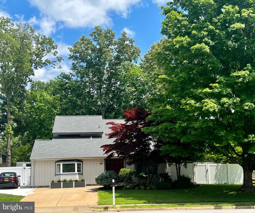 Beautiful contemporary home, lovingly maintained, updated throughout and move-in ready. Enjoy professionally landscaped gardens in your private backyard retreat while relaxing poolside. Let the stress melt away in the whirlpool spa. The Garage was converted into a separate one-bedroom apartment suite offering its own separate living quarters, with a private kitchen, bathroom, laundry, and entry. The loft den can be easily converted into a 5th bedroom. SS Appliances,  sweeping vaulted ceiling and skylights, Separate in Law Suite in the main level with its own kitchne, Laundry and Bathroom. This open and airy floor plan offers a family room adjacent to the eat-in kitchen that includes a wet bar and a cozy gas fireplace. Plenty of storage. Conveniently located near the Virginia Rail Express (VRE) and major transportation routes. Just minutes away to shopping, restaurants and to George Mason University. Walk to Bonnie Brae E.S., Robinson Secondary M.S. & H.S.