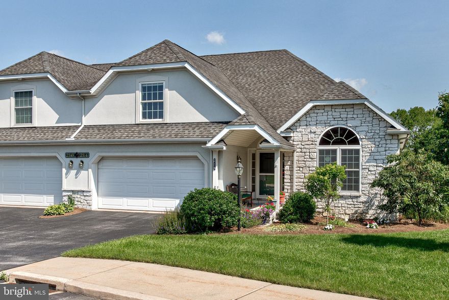 Upscale, spacious and convenient! Enjoy relaxing living in this home with many modern amenities. The foyer introduces you to a pleasant den off to the right with vaulted ceiling and plenty of natural light. From there you are ushered into an open living room with vaulted ceilings, wood floors, and gas fireplace. The entertaining area spills over into three options: a dining room with tray ceiling and a large window, a bright and airy sunroom which enjoys the other side of the fireplace and many windows, and a main floor private patio that overlooks the bike path below. Tile floors, granite counter tops, and tile backsplash accentuate a modern kitchen. The main floor owner bedroom features a spacious walk in closet and en-suite bathroom with vaulted ceiling, tile floors, double vanity, tile shower and jacuzzi tub. In addition to being a wonderful one-floor living home, the stairs can lead you to an upper floor with an additional bedroom or office and full bathroom. You also may descend to an inviting lower level with a sprawling family room that includes a wall of built in shelves, a small bar area and door to a lower-level patio. In addition, there is another bedroom and bathroom on this level, providing multiple living spaces. And to make your day end the right way, spend some time on the back patio. Private, covered, and with a view that blends naturally into the landscape, this area feels like an exceptional getaway. If you have a need for an even greater space for an event or just to get a group together, the clubhouse has very attractive indoor and outdoor spaces for many types of gatherings. Easy, one floor living, close to amenities and with some flare that can be tailored to anyone’s desire, this is a great opportunity!