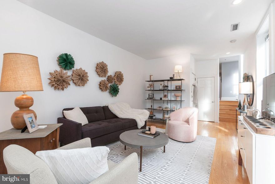 Fantastic, spacious 2 Bedroom, 2 Full Bath condo with PRIVATE REAR DECK, located on a charming, tree-lined street in the extremely desirable Art Museum / Fairmount neighborhood.
This spacious, light and airy condo, located on the 2nd floor of a boutique building, boasts high ceilings, oversized windows, incredible natural light, hardwood floors, updated kitchen and more. Gorgeous, updated, eat-in kitchen with white cabinets, stone countertops, stainless steel appliances and recessed lighting. Wonderful layout with a centrally located living room and kitchen with the 2 bedrooms nicely situated at opposite ends of the condo. The large front bedroom includes an abundance of closet space, oversized windows and a private full bathroom.  The rear bedroom provides access to the 2nd full bathroom and a rear deck.   The private deck area with a tranquil backdrop of nature with a mature tree is a wonderful place to enjoy a morning cup of coffee/tea and also a wonderful place to unwind at the end of the day with a glass of wine. The unit has an in-unit washer and dryer as well a designated storage area in the basement. 
 This boutique building consists of only 4 units. Enjoy the many, wonderful nearby restaurants, museums and cultural events. Go for a walk, run or bike ride on Kelly Drive past Boathouse Row into Fairmount Park! You can walk to everything from this location. The Philadelphia Museum of Art, Barnes Museum and the Rodin Museum. Many wonderful restaurants and cafes: Fare, Philly Flavors, A Mano, La Calaca Feliz, Jack's Firehouse, Bishop's Collar, Urban Saloon, Tela's Market, Bar Hygge, Fairmount Tavern, Pier Bar, Rybread, Zorba's, McCrossen's Tavern, Kite & Key, Sabrina’s, Osteria, South and more! Grocery shopping is a delight at the fantastic Whole Foods complex and also enjoy shopping at Target! Walk to the Wine and Spirits, post office and hardware store. Many area gyms and yoga studios. Enjoy this dog friendly neighborhood with the Green Street Dog Park just a few blocks away! If you have green thumb, you can sign up for your own garden plot at the nearby Community Garden. A pleasant walk to center city. Nearby universities. Nearby access to public transportation and major routes.