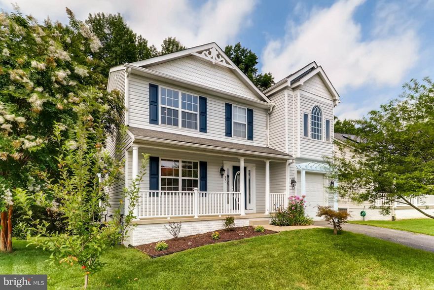 OPEN HOUSE AUG. 27 FROM 12-2 This home shines! Are you looking for an open floor plan with gorgeous cherry floors and a designer kitchen flowing out to a wooded view from the oversized deck? How about cathedral ceilings in your master bedroom with a spa-like bath? There's even a first floor bedroom and full bath or use it as a family room. Huge walkout unfinished basement. Garage is a nice bonus!