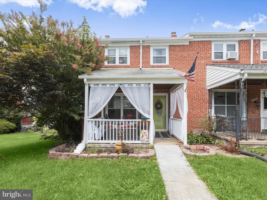 This brick-front rowhome presents a strong opportunity for investors looking for their next renovation project — and may also be an ideal fit for a homeowner ready to roll up their sleeves and add personal value through updates. Offered strictly as-is, the property will require updates and repairs, but its layout and location make it a worthwhile consideration. Step inside from the covered front porch to find an open-concept main level with hardwood floors that flow through the living and dining areas. The kitchen is equipped with stainless steel appliances, gas cooking, and a peninsula island, and offers direct access to a rear deck that overlooks the fenced yard and parking pad. Upstairs, there are three bedrooms and a full bath featuring a deep soaking tub. The lower level is partially finished and includes a bonus room that could serve as a potential fourth bedroom, along with a workshop area complete with a workbench, additional storage, and walkout stairs to the rear lawn. Updates include a new washer and dryer (2024) and HVAC (2023). Conveniently located near I-695, I-70, and MD Route 40, this home is just minutes from the many shopping and dining options in Catonsville. With the right updates, this property could offer great returns.