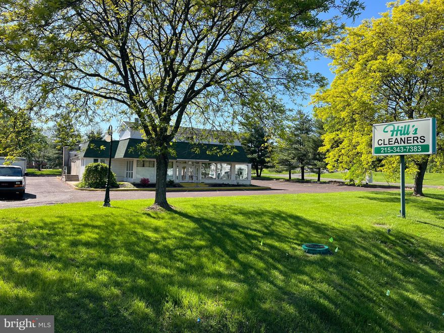 Large, solid building on 1.16 level acres at lighted intersection with a drive-thru. Traffic count 44,000. 30+ parking. Former Hill's Cleaners. Located right in front of Warrington Township Building. BZ zoning allows for many uses - please find these attached. Open floorplan allows for many uses. Loading door in rear.