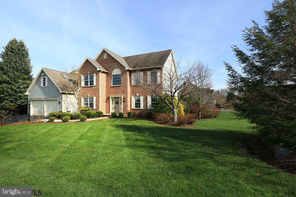 This home checks all the boxes. Fantastic neighborhood, a bike path & park just around the corner. Just minutes to Penn State Campus, shopping, restaurants. Updated kitchen with quartz counters & stainless steel appliances. Open floor plan featuring a light filled family room w/vaulted ceiling & skylights. Master bedroom suite boasts a spacious bathroom and walk in closet with builtins. A bedroom suite with it's own bath and bonus room, wood flooring to be installed in bonus area. Expansive deck with awning, wonderful lot with extensive landscaping. Finished walk put basement with full bath. Visit the link for a 3D Matterport Video https://my.matterport.com/show/?m=8CAc1PkFhgz   Visit Virtual Tour at https://rem.ax/2EmsY8B