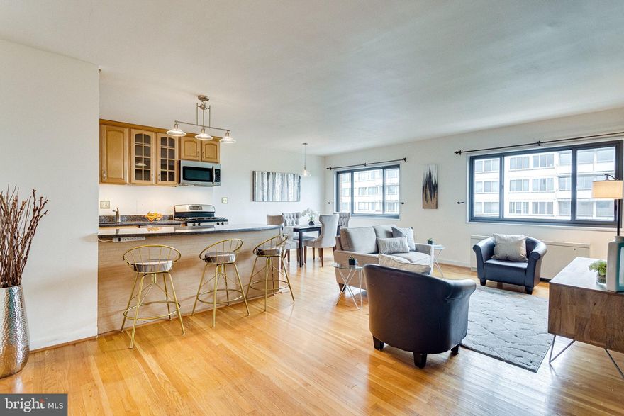 Incredible price, incredible light, incredible location. This airy, sun-drenched, open-floorplan, top-floor, one-bedroom, corner condo unit truly is a hidden gem. The large living/dining area can accommodate workspace, a dining table, AND a generous seating and entertaining area. Affordable real estate in 22202? Yes. Living here could not be easier. Groceries, restaurants, parks, coffee shops, and Amazon's HQ2 are all within a short distance. With Pentagon City Metro a 12-minute walk away and bus stops even closer, you won't need a car, but if you want one, TWO permits for the lot in the back are included (or park for free anywhere on this block of Arlington Ridge Road!). 
The condo fee includes ALL UTILITIES: gas, electric, water, trash, and those two PARKING permits (easily a $50,000 value in this ZIP code). Enjoy the never-crowded, sparkling pool May through September. Enjoy the lively Pentagon Row ice rink November through March! Watch Fourth of July fireworks from Prospect Hill Park less than one block away. Drive to DC without encountering one single traffic light. Come home via Arlington Ridge Road's own exit ramp! Good condo board governance means multiple recent improvements and upgrades to the building (with more planned), such as an electrical switch gear replacement and new awning, roof, tuck-pointing to the bricks, exterior painting, landscaping, signage, and windows. Kitchen appliances upgraded in 2012, bathroom completely renovated in 2014, and bedroom carpet installed in 2017. All this, plus the amazingly low price of this unit means you can afford to enjoy all the DC Metro area has to offer!