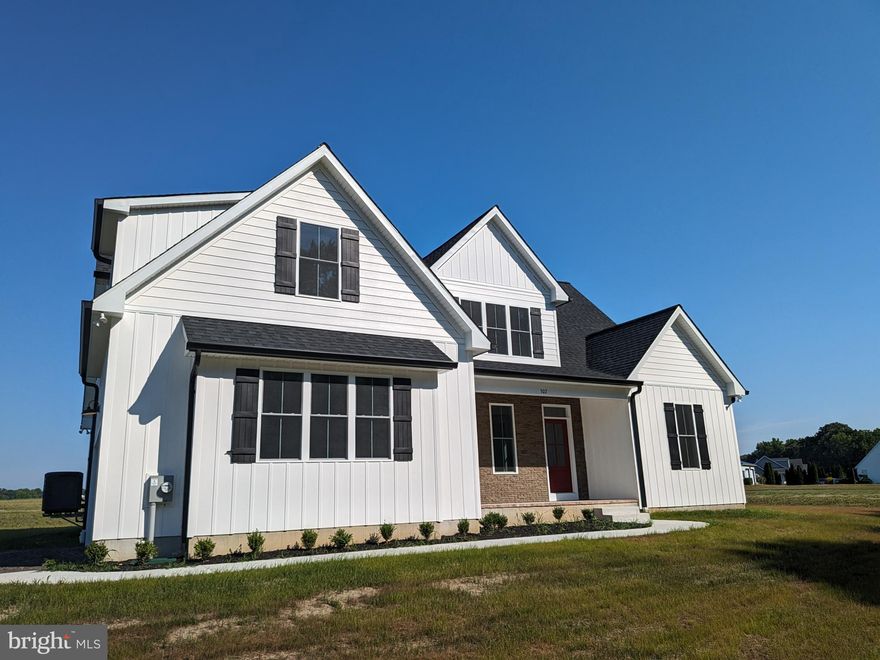 Construction is now complete on this fantastic home!!! Nestled in a serene, rural landscape, the only thing this gorgeous newly built home still needs is you. From the moment you step inside, you’ll discover a harmonious blend of comfort and sophistication. With four bedrooms, including a convenient first-floor master suite, this home offers ample space for relaxation and privacy. The heart of this residence is an open-concept layout, seamlessly connecting the living, dining, and kitchen areas. Imagine hosting gatherings with ease and enjoying the flow of natural light. The stunning kitchen boasts stainless steel appliances and gleaming white granite counters—a chef’s dream. Step onto luxury LVP flooring, providing both elegance and durability. Beyond aesthetics, this home incorporates valuable features such as spray foam insulation and a conditioned crawlspace, designed to minimize costs and maximize comfort.

Additionally, you’ll appreciate the convenience of a two-car garage—perfect for parking or additional storage. Upstairs, a spacious bonus room awaits your creative vision. Whether you envision a home office, playroom, or media center, this versatile area provides endless possibilities.

Picture yourself unwinding on the quiet country road that leads to your doorstep. As you gaze out, the property backs up to a pastoral farm field, offering a sense of tranquility rarely found. Don’t miss this opportunity to own a slice of rural paradise. Schedule a viewing today and experience the peace you’ve been longing for