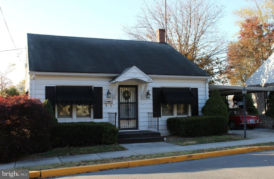 Four Bedroom Cape Cod in the Borough of Greencastle.  Home features hardwood floors, main level bedrooms and bath.  Lower level has a family room.  Screened in back porch and oversized carport with storage.