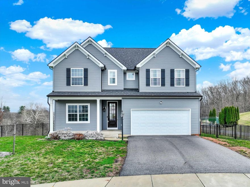 Hard-to-find 5-bedroom home with a main-level primary suite located on a quiet cul-de-sac in the highly desirable Rolling Meadows community. This spacious 5-bedroom, 2.5-bath home offers a layout that buyers are constantly searching for—convenient first-floor living paired with generous space for family, guests, or a home office. Inside, the bright and open floor plan creates a natural flow for everyday living and entertaining. The primary suite on the main level provides comfort and privacy with its own ensuite bath, while the additional bedrooms offer flexibility for growing households or work-from-home needs. Step outside to a fenced backyard with peaceful views, where it’s common to spot deer passing through, adding to the relaxing setting. The unfinished walk-out basement provides an excellent opportunity to expand your living space with a future rec room, home gym, theater room, or additional living area. Located in Rolling Meadows, residents enjoy community amenities including a swimming pool, playground, basketball court, and pool house, creating a welcoming neighborhood atmosphere. Situated on a low-traffic cul-de-sac yet conveniently close to Route 30, I-83, shopping, dining, and everyday conveniences, this home offers the perfect balance of neighborhood living and commuter accessibility to York, Harrisburg, and surrounding areas.