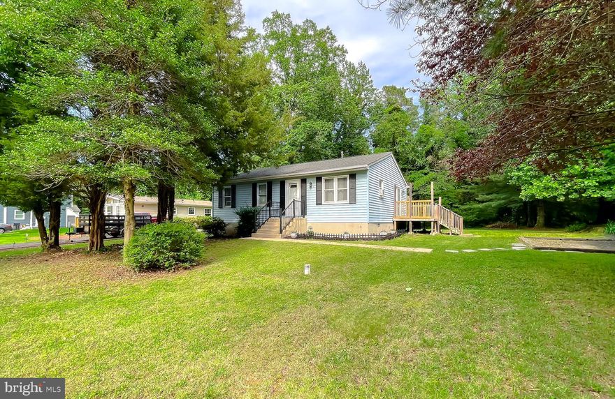 Large Flat Corner Lot, with Mature Trees!!!! This 3-bedroom, 2-bathroom rambler is located in a highly sought out Drum Point neighborhood. The main suite features a large walk-in closet!  A large inviting backyard to host all of your spring, summer, and fall activities and events. The home features recent updates that include flooring throughout and a nice, updated kitchen, a newer sliding glass door, windows, and roof!