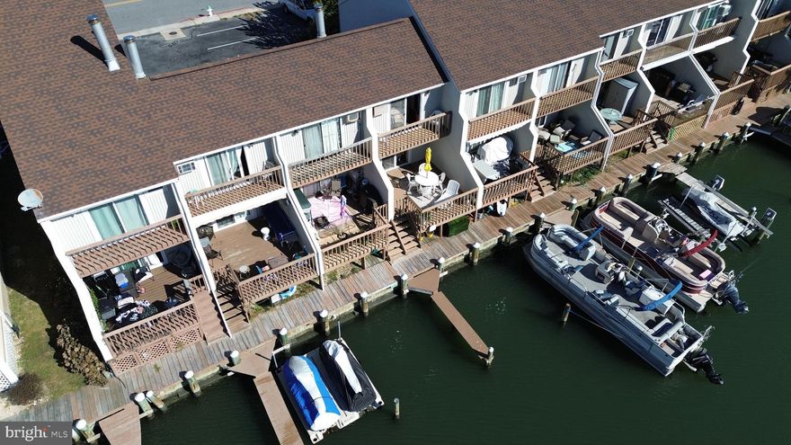 Welcome to your perfect retreat! This meticulously maintained 1-bedroom condo, featuring a spacious loft area and 1.5 baths, is ideally situated on 28th Street, offering stunning direct waterfront views. Built in 1982, this home combines classic charm with modern comforts. Imagine stepping out onto your fabulous rear sundeck, where you can soak up the sun and enjoy the tranquility of the deep, wide canal. The second-level patio provides an elevated view, perfect for morning coffee or evening relaxation.
With two brand new wall A/C units and affordable baseboard heat, you’ll stay comfortable year-round. Plus, the convenience of a deeded boat slip right in your backyard means you can park your boat at home and skip the hassle of winter storage! Whether you're looking for a weekend getaway or a permanent residence, this condo has everything you need. Don’t miss out on this incredible opportunity—this gem won’t last long! Schedule your showing today!