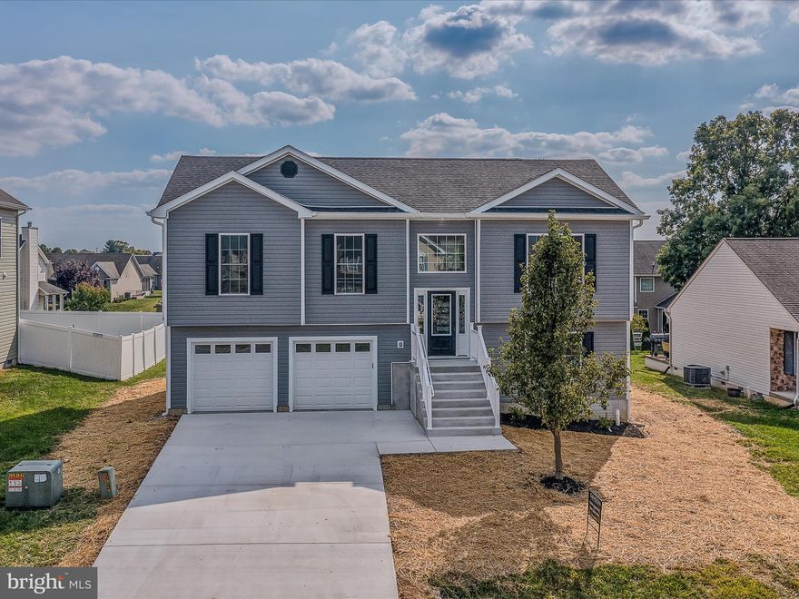 Welcome to your dream home! This exquisite BRAND NEW 4-bedroom, 3-bathroom residence, is loaded with premium upgrades that offer comfort and style.  Some Main Features:
Entry-Level Bedroom with Full Bath off garage level...2-Car Garage with concrete driveway: Provides ample space for vehicles and storage.
Top-Quality Cabinets and Counters: Elegant and durable finishes  with granite/ quartz in the kitchen and bathrooms.
Tile Shower: A luxurious feature in the bathrooms.
LVP Flooring: High-quality luxury vinyl plank flooring throughout, combining beauty and easy maintenance.
12 x 12 Deck: A great space for relaxing and enjoying the outdoors.
There's so much to love about this home, from its thoughtful design to the high-end finishes. Don't miss the opportunity to make it yours!