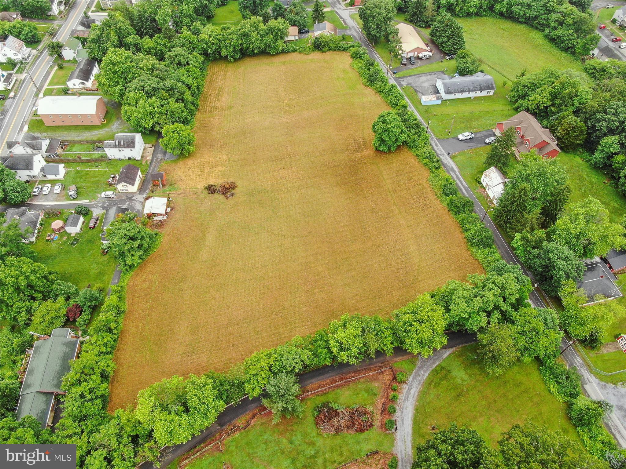 Don't miss your perfect opportunity! Listed at below appraised value nestled quietly in the town of Hedgesville, WV, these 3.33 acres zoned residential/low density have endless possibilities. Highest and best use is for single family detached residential homes, mobile homes, or duplexes. Maximum allowed for single family detached homes is 3 (one home per acre), or 12 duplexes (4 units per acre allowed), or 6 mobile homes (2 units per acre allowed). The property has substantial frontage on both Potato Hill St. and Skinner St. for easy access. Public water and public sewer available. Ideal commuter location within just a few short miles to I-81 and the MD and VA state lines, and close proximity to Washington DC. This is a fantastic opportunity for builders and investors.