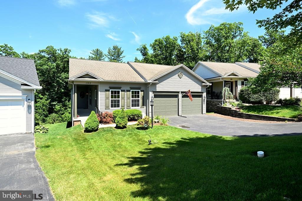 Single family home in the Village of Penn State, Tradition Point is ready for you! This residence offers one floor living and a sun-filled finished lower level with full bath, wet bar, media and family rooms, plus it walks out to a covered patio. On the main floor, the windowed kitchen with counter seating is a compliment to the open living/dining room which leads to the sunroom and deck. Owner's bedroom suite with full bath and walk-in-closet, two additional bedrooms, another full bath and laundry room complete the first floor. Some of this home's special features are: covered front porch, oversized two car garage, under cabinet lighting in kitchen and wet bar with small refrigerator and dishwasher, fresh paint, storage in lower level, cherry cabinets, lower level, gas fireplace. Annual HOA dues get you access to the gym, clubhouse and pool. Close to Beaver Stadium, airport, downtown shopping, restaurants, entertainment, parks, and bike paths!