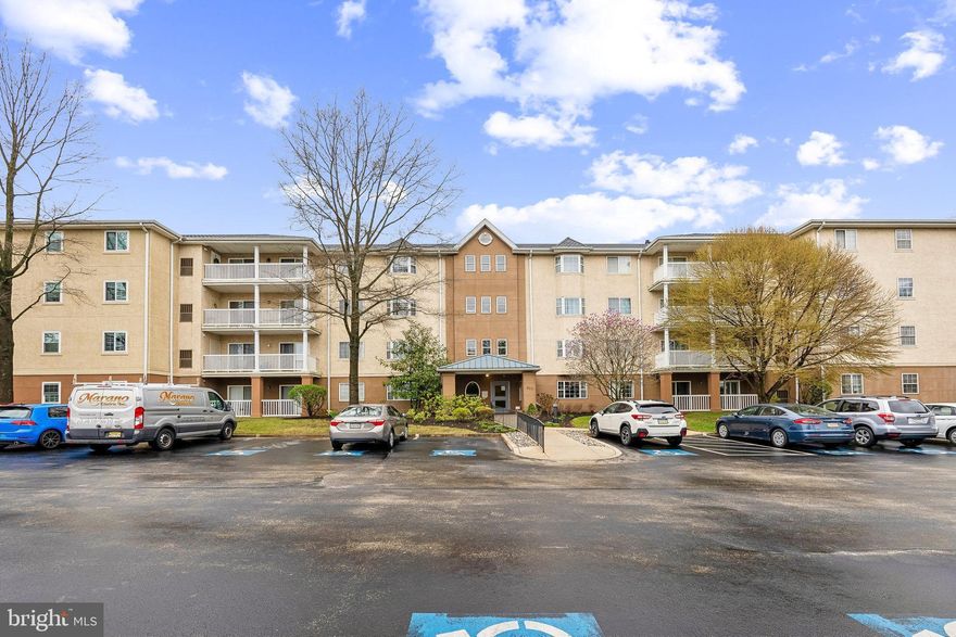 Welcome to Paoli Pointe, a desirable 55-plus community conveniently located at the intersection of Berwyn and Paoli on the Main Line. Recently updated, this private, one-floor corner unit offers 2 bedrooms and 2 bathrooms, providing both comfort and convenience. Freshly painted in a neutral color, new luxury vinyl tile in wood look throughout, and new carpet make this home move in ready. Step into the entry foyer with a large coat closet, leading to an  open living - dining room floor plan accented with a natural light from a southern exposure. The kitchen offers  white stylish cabinets with newer appliances including the stove, refrigerator, microwave, and offers plenty of storage and counter space. The washer, dryer, and a gas HVAC system, replaced in the last several years, make this home truly move-in ready. The dining room comfortably accommodates a small group and flows seamlessly into the spacious living room, complete with a cozy gas fireplace.
The primary suite features a triple-wide closet and an ensuite bath with a tub. The second bedroom is ideal for guests or a home office, while the second full bath includes a walk-in shower, with a linen closet conveniently located in the hallway. Paoli Pointe offers a secured building with fantastic amenities, including a clubhouse with a card room, library, billiards room, outdoor pool, and a variety of planned activities—perfect for making new friends while staying active and engaged. Enjoy the convenience of nearby Paoli Train Station with Amtrak service, as well as walking access to grocery stores, pharmacies, dining, and shopping. Experience a vibrant, maintenance-free lifestyle in this welcoming community.