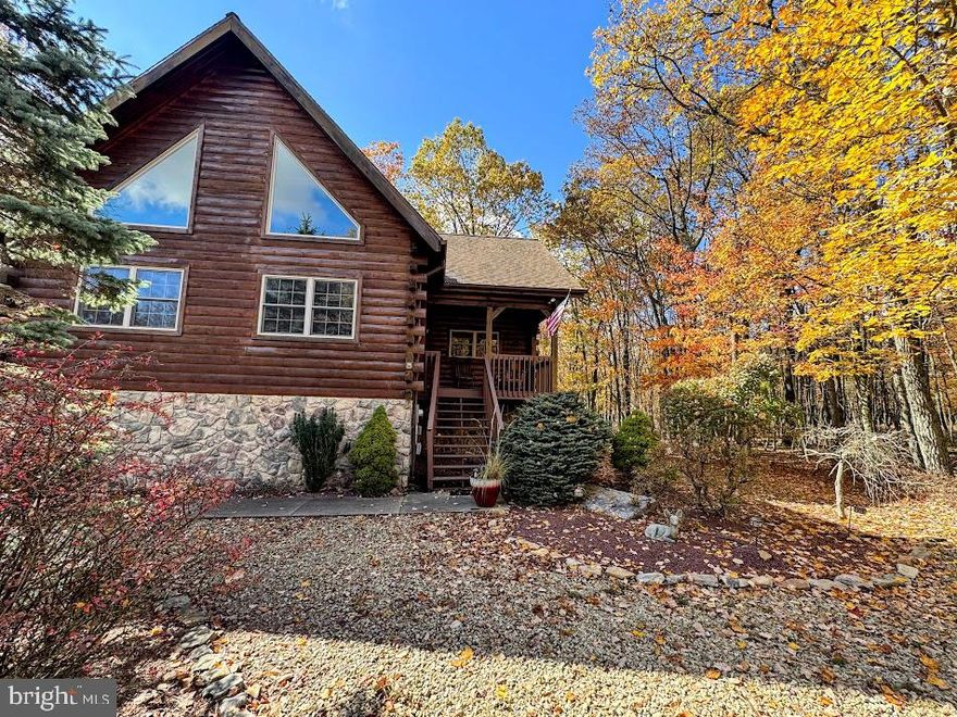 ALL LOG HOME ENTHUSIASTS, THIS QUINTESSENTIAL, COZY LOG HOME IS JUST WHAT YOUR LOOKING FOR ! IT'S THE PERFECT MOUNTAIN RETREAT HOME LOCATED IN THE 4 SEASON , GATED COMMUNITY OF EAGLE ROCK RESORT, NESTLED IN THE BLUE MOUNTAINS OF PA.  Located on a corner lot, enjoy the peaceful surrounding nature, from the screened in porch, deck, or your hot tub. This 3 bed, 3 bath home features; open concept living , vaulted beamed ceilings in LR, stone  FP in LR, hot tub, screened in porch, granite counters and island in the kitchen and so much more. 
Enjoy the 4 season amenities that Eagle Rock has to offer; 2 golf courses, lake with beach, indoor/outdoor pools, tennis, pickleball and basketball courts including a full ,  indoor basketball court, bocce ball pavillion, gym, spa , equestrian center and so much more!