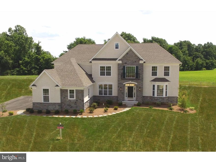 JUST FINSHED QUICK DELIVERY HOME. Move right in now to this magnificent home in one of the fastest selling communities in the region! Extraordinary location only minutes from Downingtown, West Chester, King of Prussia. Very convenient to schools, shopping, recreation, the Downingtown Train Station and more. The Bellingham Manor is a gracious plan designed for both awesome entertaining and everyday family living with a front to back entry foyer, spacious living room and dining room with tray ceiling, fireside gathering room with volume ceiling and spacious gourmet kitchen with dramatic mantle style grotto, granite counters, custom center island, stainless steel double-oven and cooktop adjoining a light-filled expanded breakfast room with sliding doors leading to an expansive patio. A first floor study offers backyard views. The master suite with tray ceiling has a luxurious bath with dual vanities, garden tub and private water closet plus dual walk-in closets and a sitting room. Three additional bedrooms and two full baths complete the second floor. Exterior HardiPlank Siding & Cultured Stone. Beautiful extra large paver patio. Ready to finish basement with 9' walls and plumbing roughed-in for a full bath. Wide Walk-up steps from Basement to paver patio. Great Views. Backs to deed restricted land. A fantastic home for the price. Consult sales manager for options shown.  Renderings may show options not included in price.