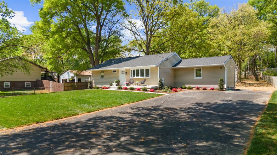 Ideally located in the heart of downtown Odenton, this beautifully renovated and move in ready rancher is within walking distance to restaurants, the library, and shopping, while offering easy access to major highways and commuter routes. Just minutes from the Odenton MARC Station, commuting to Washington DC or Baltimore is a breeze. Enjoy nearby shopping and dining at Waugh Chapel Towne Centre, along with close proximity to Fort Meade and the National Security Agency. Outdoor enthusiasts will also appreciate being near Piney Orchard Nature Preserve.
Situated on a large lot of over half an acre, this home offers exceptional space and versatility both inside and out. The property features an oversized detached garage with workshop, RV hookup, along with a double driveway, including one that has been freshly paved, providing ample parking for a dozen or more vehicles, perfect for entertaining, RVs, or boats.
The exterior showcases a brand new architectural shingle roof, newer insulated vinyl siding, freshly laid sod, and updated landscaping, creating strong curb appeal from the moment you arrive. The home also features a brand new HVAC system, offering added comfort and peace of mind.
Inside, gleaming newly refinished hardwood floors flow throughout the main level. The beautifully renovated kitchen features 42 inch cabinets with soft close drawers, brand new stainless steel appliances, quartz countertops, and a dining area just off the kitchen. French doors lead directly to the expansive backyard, ideal for indoor outdoor living.
The bathrooms have been fully renovated with custom tile work and timeless finishes, and the entire home has been freshly painted. The partially finished basement offers additional living space with brand new luxury vinyl plank flooring, a full bathroom with a large walk in shower and bench, outdoor access, and a dedicated laundry room. Plus unfinished space offering plenty of storage . 
Natural light fills the home, complemented by recessed lighting throughout. This is a truly quality renovation offering both style and function. Interior photos coming soon.