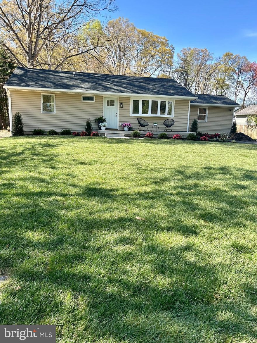 Ideally located in the heart of downtown Odenton, this beautifully renovated and move in ready rancher is within walking distance to restaurants, the library, and shopping, while offering easy access to major highways and commuter routes. Just minutes from the Odenton MARC Station, commuting to Washington DC or Baltimore is a breeze. Enjoy nearby shopping and dining at Waugh Chapel Towne Centre, along with close proximity to Fort Meade and the National Security Agency. Outdoor enthusiasts will also appreciate being near Piney Orchard Nature Preserve.
Situated on a large lot of over half an acre, this home offers exceptional space and versatility both inside and out. The property features an oversized detached garage with workshop, RV hookup, along with a double driveway, including one that has been freshly paved, providing ample parking for a dozen or more vehicles, perfect for entertaining, RVs, or boats.
The exterior showcases a brand new architectural shingle roof, newer insulated vinyl siding, freshly laid sod, and updated landscaping, creating strong curb appeal from the moment you arrive. The home also features a brand new HVAC system, offering added comfort and peace of mind.
Inside, gleaming newly refinished hardwood floors flow throughout the main level. The beautifully renovated kitchen features 42 inch cabinets with soft close drawers, brand new stainless steel appliances, quartz countertops, and a dining area just off the kitchen. French doors lead directly to the expansive backyard, ideal for indoor outdoor living.
The bathrooms have been fully renovated with custom tile work and timeless finishes, and the entire home has been freshly painted. The partially finished basement offers additional living space with brand new luxury vinyl plank flooring, a full bathroom with a large walk in shower and bench, outdoor access, and a dedicated laundry room. Plus unfinished space offering plenty of storage . 
Natural light fills the home, complemented by recessed lighting throughout. This is a truly quality renovation offering both style and function. Interior photos coming soon.