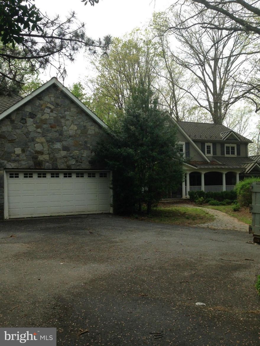 This house is a shell, bank owned ans strictly sold in as-is condition. Beautiful wooded lot bring your architect and contractor.