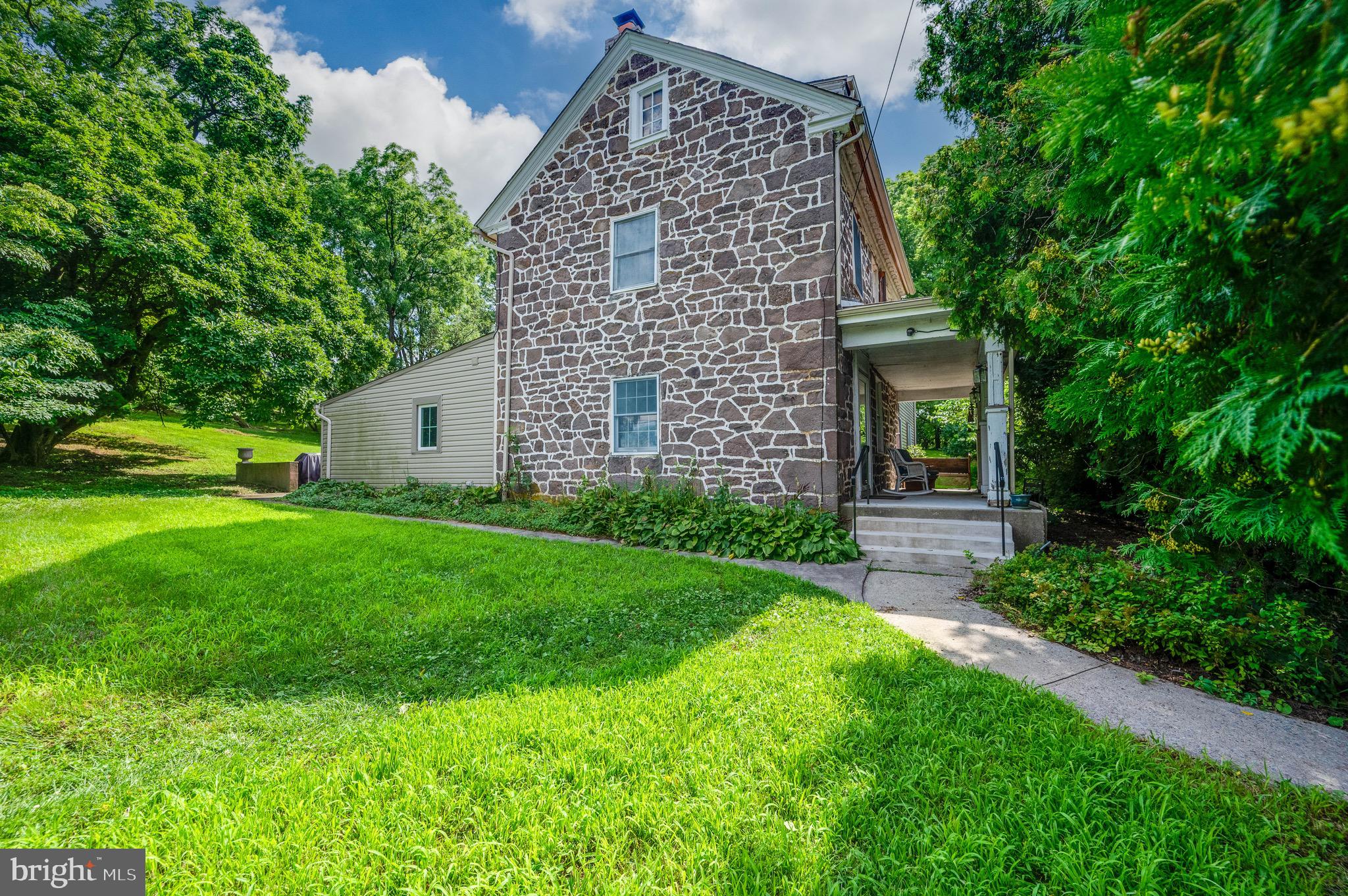 Historic Charm Meets Modern Comfort on 2.5 Acres
Discover the perfect blend of original farmhouse character and modern amenities in this stunning 3,900 sq ft farmhouse set on 2.5 serene acres. Featuring 3 bedrooms and 4 full bathrooms, including a full bath on the first floor and in the basement, this home offers flexibility and comfort for family living or multi-generational needs.
Inside, you’ll find exposed stone walls, rich woodwork, and historic details seamlessly integrated with modern updates, including an elevator for added convenience. An oversized sunroom creates the ideal space for large gatherings, an artist’s studio, or a versatile play area—the possibilities are endless.
The spacious kitchen and living areas provide an inviting layout for entertaining, while the three-car garage with electric and an attached shop offers exceptional storage and workspace for hobbies or small business needs.
Enjoy the peace of rural living with the advantage of a convenient location for accessing Berks and Lancaster Counties, making commuting, dining, and shopping easily accessible.
This one-of-a-kind property offers a rare opportunity to own a charming farmhouse with modern comforts and expansive entertaining spaces. Don’t miss your chance to make this your forever home—schedule your private showing today!