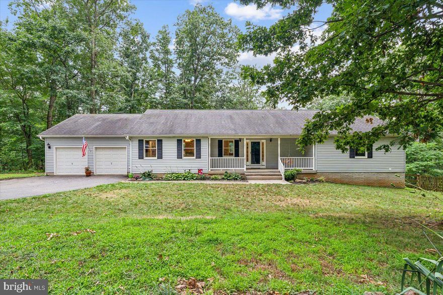 Wooded 4.2 acres with semi-privacy awaits you!  If you've been looking for space, nature, and open living - this might be the one!  Smartly designed floor plan with main level holding 3 bedrooms, 2 full bathrooms, kitchen, butler's pantry, dining area, living area, and laundry.  A true owner's suite with a full bath with soaking tub and double closets. Stunning hardwood floors with lots of natural light bring a welcoming feeling. Walk out to the back deck and enjoy the trees or sip your coffee from the front porch.  Every season radiates at this gorgeous property.
Located at the top of Starwood Drive, you still have plenty of parking for guests with a 2 car garage, driveway and paved parking area.  Host holidays and enjoy football season in the fully finished basement holding a bonus room, office, walkout to patio, half bath and bar.  Owners have taken the time to do important upgrades like fencing backyard (property lines go beyond the fence),  the primary bath shower, bar area in basement adding a gas fireplace, deck,  and A/C + Furnace (2020). 
Driveway from Harvey Grummel Rd. was paved September 2023 - no driving up gravel! Agents please read instructions in notes.