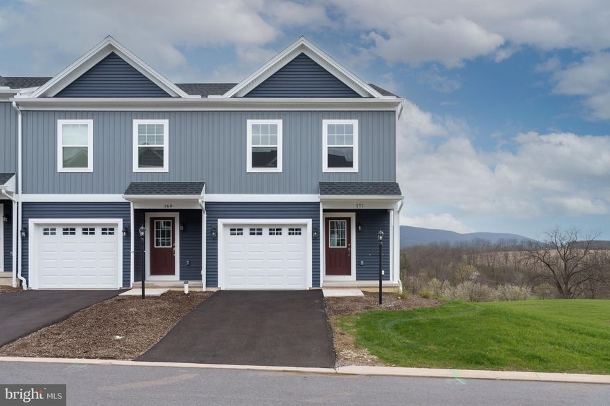 Steeplechase offers a suburban setting with walking paths and landscaped common areas, located 5 minutes from I-99, near Historic Bellefonte, and 10–15 minutes from Penn State University. 

The Steadfield end-unit plan features a kitchen with quartz countertops, gray cabinetry, a center island with overhang, and Whirlpool appliances, including a smooth top range, microwave, and dishwasher. Wafer LED lighting is included throughout. A 10' x 10' pressure-treated deck provides outdoor space. The owner’s suite includes a private bath, and second-floor laundry adds convenience. The home also includes an unfinished walk-out basement with a full window on the rear wall, a garage door opener, gas heat, and central air.

Contact us for more details on this home.