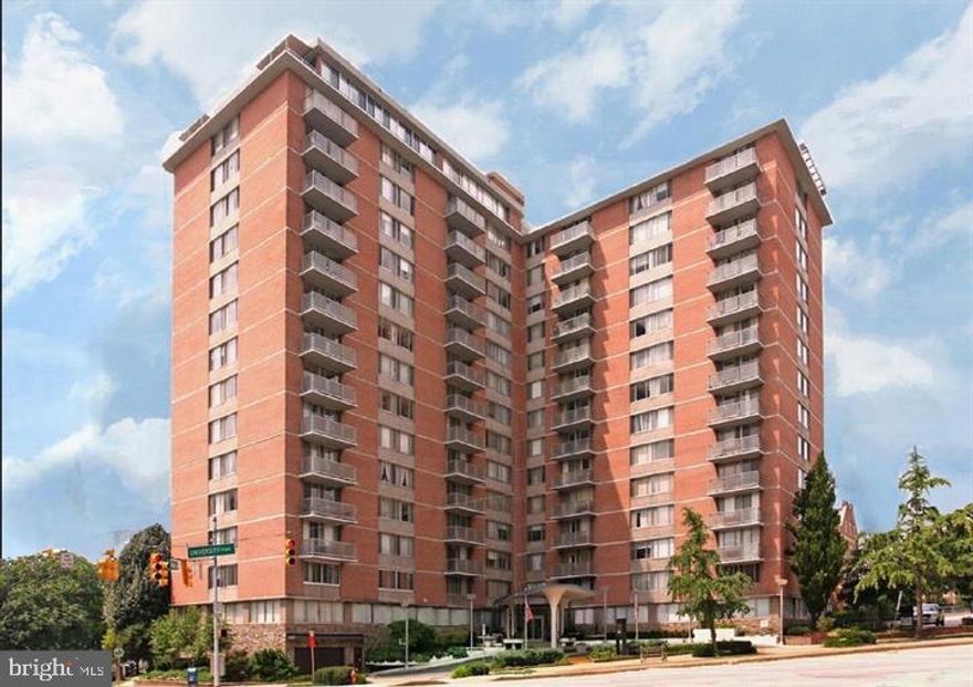 This charming studio unit is available for lease beginning October 11, 2025 and features updated kitchen and bath along with balcony with great views of Guilford Park. Newer carpet and freshly painted. Walking distance from JHU Homewood Campus. Pool, exercise room.  Rent includes: water, gas, electricity, HOA, heating, and AC! Onsite front desk support. The building has a roof-top swimming pool, and ground level community room with big-screen TV and full service kitchen that residents can rent for private parties and gatherings. On-site laundry is available. On-site, garage parking is available as well for a fee.
You can easily jump on the free Shuttle Buses that stop just outside the door to site see Charm city. Check out the south view of Charles Village and the Johns Hopkins’ Campus. The Charles Village Shopping Center is just a block away with Barnes and Noble, Starbucks, Chipotle, and other name retailers. Other features include Zip Car rentals just across the street.