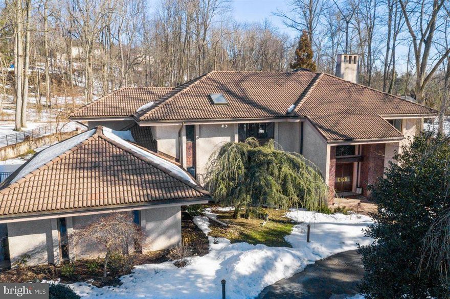 Don't miss the opportunity to show this absolutely stunning, elegant, sophisticated and updated custom home situated on one of the most beautiful and sought after cut-de-sac locations in Bryn Mawr.   You will appreciate the unique and special character of this amazing home, the minute you enter the spectacular, grand, 2 story entry foyer which is bathed in natural light and features a stunning crystal chandelier, marble floors and designer accented curved staircase.  Step down to the impressive great room that is a perfect gathering place for entertaining.  Gather around the gorgeous fireplace that includes a granite surround and granite raised hearth.  The chef of the house will appreciate the fabulously well appointed gourmet kitchen with beautiful granite counters,  oversize island, 2 sinks, gas cook-top and an abundance of imported custom Siematic cabinetry.  The sunny and spacious breakfast area offers a greenhouse window along with sliding doors that lead to a spectacular screened porch  that was recently added.  The sunroom overlooks the incredible grounds and offers high ceilings and walls of windows.   On the upper level, the primary bedroom is spacious and luxurious, featuring a sitting room/office, large bedroom with a fireplace, dressing area and 2 large walk-in closets.  That marble bathroom has 2 Siematic vanities and cabinetry, jacuzzi tub over sized shower.  There are 3 additional well proportioned bedrooms and 2 new full bathrooms on this level.  The lower level is finished and includes an additional bedroom with proper egress, along with a full bath and work-out room and game room.  For the wine enthusiast, there is a large wine cellar.  When you step outside, you will want to vacation at home!  Magnificent gardens, beautiful swimming pool and expansive patio with fire pit add to the charm and appeal.  This almost 1.5 acre property is truly unique and special.  You will not want to miss the chance to call it home!