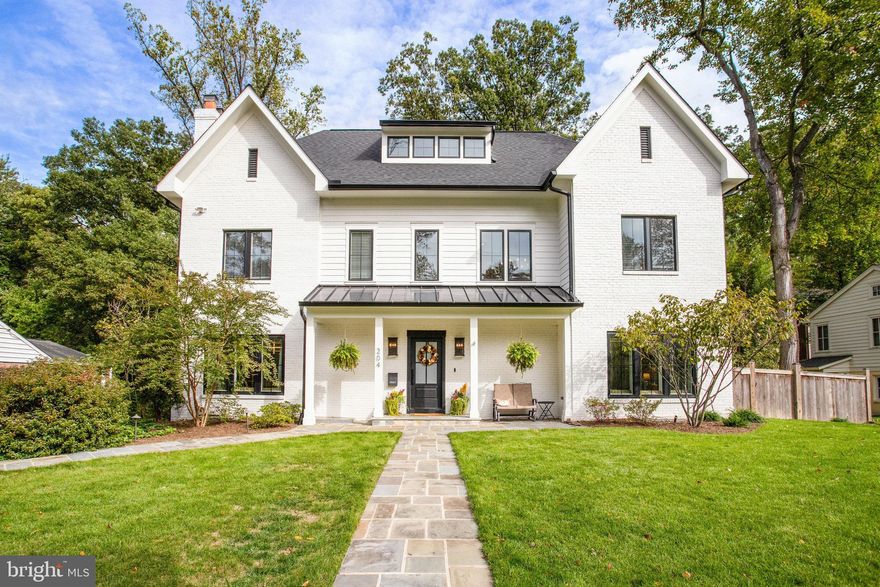 Beautiful 5BR/4.5BA Modern Home on 1/4 acre lot in quiet Broadmont neighborhood of 
Falls Church City.  Newly built in 2022 on existing foundation w/ over 5,000 sq ft of living 
space on three finished levels.  Hardwood Flooring and Luxurious products & finishes 
throughout including  Wolf appliances, Anderson 400 series casement windows, and 
5" red oak hardwood flooring.   Large screened back porch overlooking private backyard 
w/ Flagstone Patio, mature plantings & landscaping, plus Separate Garage. 

Main Level Grand entry Foyer enters to open floorplan with combination Dining room 
(w/ fireplace), Gourmet Kitchen with huge eat-in Island, 6-Burner Stove with Range Hood, 
plus wet-bar area.  Family Room w/ Gas Fireplace & Tray Ceiling, opening to screened porch, 
plus mud room.   Formal Living Room plus Den/office (can convert to bedroom) and powder room.

Upper Level Hall leads to Primary Bedroom Suite with Gas Fireplace & Tray ceiling, Dressing/
make-up areas plus His & Her walk-in closets.  Spacious Primary Bathroom with Dual Vanities, 
Separate Shower & Soaking Tub.  Second En Suite Bedroom w/ Full Bathroom, 
3rd & 4th Bedroom share a 3rd full Jack & Jill Bathroom, plus separate Laundry Room 

Lower Level features Large Recreation Room w/ Fireplace - Separate Den/Study/Office can 
easily convert to 5th bedroom.  Full Bathroom, Utility Room / Storage area, plus bonus 
Storage Room/Play room.

Amazing location near Four Mile Run Park, Benjamin Banniker Park & Benjamin Banniker Dog Park.  
Plus only 3/4 mile to East Falls Church Metro Station, with easy Access to I-66, I-495, 
Routes 7 & 50, and a short commute to Washington DC and The Pentagon.  
Fantastic Falls Church City School Pyramid w/ newly constructed Meridian High School.