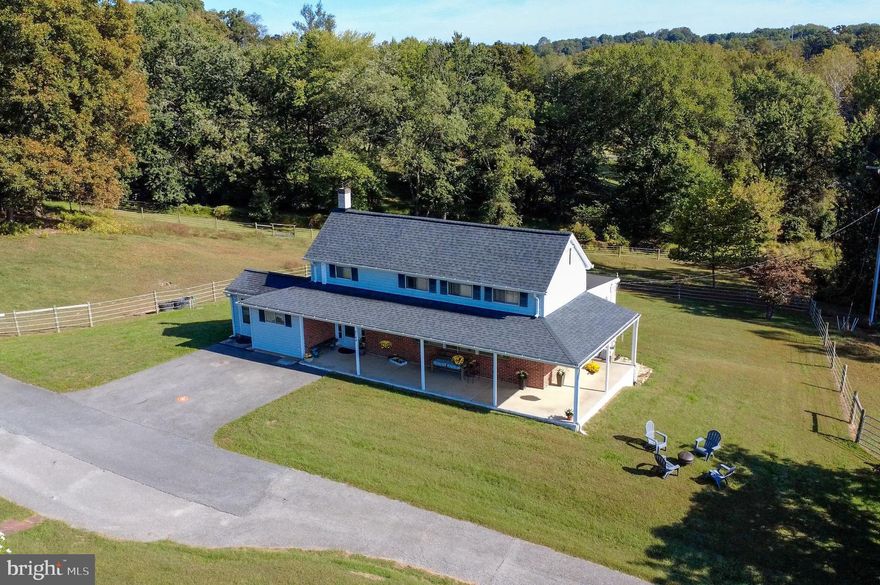 *Shown by appointment only. No drivebys please.*
Welcome to 2740 Terrapin Run in West Friendship, MD! This cozy 1920 farmhouse set on 4.1 acres, is a fantastic spot for anyone looking to bring home their horses or enjoy a peaceful country lifestyle while being close to Route 32 and I-70 for easy commuting.
The house itself is all about comfortable living, with a main level suite, and a spacious family room with exposed ceiling beams for hanging out. Upstairs, you'll find two more bedrooms and a bathroom that's great for guests, while the walk-out lower level includes another suite including a large all-purpose room for extra flexibility and privacy. And don't forget to relax on the large wrap-around porch that invites you to enjoy the views of your expansive property.
If you're into horses, this place is a real treat. There's a barn with 2.5 stalls, complete with electric and water, a wash stall, and plenty of storage for hay and tack in the large pole barn. The fully fenced pasture wraps around the home, offering lots of space for your horses to graze. Plus, you'll find a dry lot, a fenced turf riding ring, and even gravel pad plus a circular barn driveway for convenient trailer parking and hay delivery.
With tons of updates throughout, this farmhouse has everything you need for a laid-back yet practical lifestyle. Whether you're an equestrian enthusiast or just looking for a charming country home, 2740 Terrapin Run has got you covered. Sold As Is with a Home Warranty . 
Updates include:
Well foot valve and jet pump 2023
Roth Eco DWT Plus 3 oil tank, maintenance free, guaranteed against leaks, double wall oil storage installed by certified installer 2023
Water softener neutralizer system 2021
Well pressure tank 2021
Invisible dog fence around the house invisible fence 2020
5 rail vinyl coated pasture fencing and new gates 2020. Powered by 2015 solar charger
Barn siding 2019
Electric car charging 240 Volt 50 amp car charger outlet 2018
Asphalt parking pad, 2 parking spots in front of house 2018
New shed roof 2018
New house roof and gutters 2018
Main electric panel upgrade 2017
Mini split heat pump system (heat AC fan) main floor of home 2016
Barn configured for horse and pony stalls, new roof added over stalls 2015
Wood fencing and gates for grass and dry lock paddocks by the barn 2015