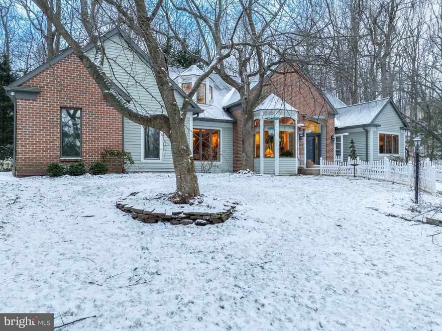 Absolutely stunning 2-story home situated in the prestigious Vineyards community, featuring 4 bedrooms, 2 ½ baths, and over 3,100 square feet of furnished living space on 2.44 acres. The property includes a heated inground pool and a main floor primary ensuite.
Once inside, the unique features of this home will take your breath away. The lovely foyer leads into the formal living room, which boasts high ceilings and hardwood flooring. The formal dining room features crown molding, a tray ceiling, and large wall units.
The remodeled kitchen is a chef’s delight with a huge center island with seating, induction cooktop with pop-up exhaust, and pull-up internet and electric hook-ups. It also includes sensor-controlled faucets, cabinet lighting, a combination convection wall oven and convection microwave oven, a separate microwave drawer, two dishwasher drawers, prep sinks, a brick fireplace, and plenty of maple cabinets and countertop space. Sliders lead out to the beautiful enclosed, screened in sun porch with vaulted ceilings, operable skylights, a ceiling fan, surrounded by a garden pond and views of the landscaped yard.
The 2-story family room allows for abundant natural light, featuring a wall of windows, solar-powered skylights, hardwood flooring, a brick fireplace, a 100-bulb chandelier, and a lovely wall mural.
The laundry room is equipped with a sink and sensor-controlled faucet, counter space, tiled floor and lots of maple cabinetry storage.
The primary ensuite includes hardwood flooring, a stone floor-to-ceiling fireplace with a partial cathedral ceiling, ceiling fans, solar skylights, french doors to the rear yard, and a cedar floor in the large walk-in closet. The spacious primary bath offers a double vanity, a jetted tub with stonework, and a separate stall shower.
There is also a main floor office/media room with surround sound and vaulted ceiling and a powder room on this level. 
Upstairs, you’ll find a landing with an overlook into the family room, perfect for a book nook. There are 3 bedrooms with large closets and a full hall bath with a double vanity. One bedroom is a suite and the other attached room has a window seat and craft closet/homework desk. Another bedroom has a tray ceiling with LED lighting.
The lower level is waiting to be finished off for additional living space. It features high ceilings and propane connections.The outdoor oasis will be the perfect entertainment space for friends and family, featuring a heated inground pool, a beautiful pond with a waterfall and stream, a large pergola, and extensive hardscaping, including rock retaining walls, steps, a paver patio, and a boardwalk along the pond. It is also outdoor kitchen ready!
Additional amenities include a brand-new roof, exterior painting, central vac, a whole-house speaker system with controls for individual rooms/porch, a newer furnace, a 1,000-gallon inground propane tank, and a 2-car oversized attached garage. This home is already set up for the work-at-home owner with networking hardware, a remote access point, and Wi-Fi extenders for wired or wireless connections.
The property spans 2.44 acres, providing plenty of privacy.  This fantastic home comes completely furnished with all tasteful and stunning indoor and outdoor furniture and area rungs….all included with the purchase price.
This home is a must-see to appreciate all it has to offer its new owners!