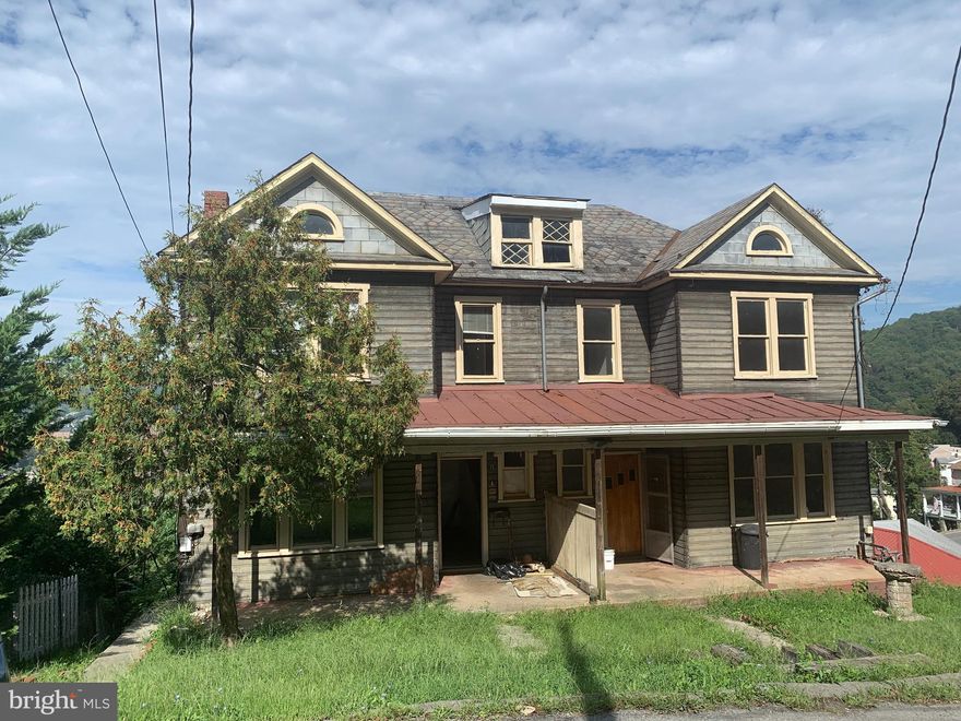 Great investment opportunity.   The number 8 side of this duplex has undergone rehab to include major electrical updates.  New flooring is on site.   You will have just a few steps to take to  the finish line for a unit with great income potential - or live in it while you rehab  Number 10.    Tax id for #10 is 0122013653.  Owner financing available.