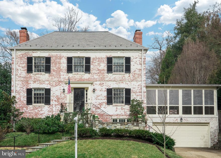 Ideally located in Kent, this stately colonial on a rarely available quarter-acre lot, offers gracious indoor spaces and a professionally landscaped yard with green space and a large pool. Featuring over 5,000 total square feet, this five bedroom, four and a half bathroom home has beautiful hardwood floors, a recently updated large, screened porch overlooking the pool and a spacious primary suite with two walk-in closets and a double vanity bathroom. This corner lot boasts fantastic outdoor areas with a beautiful pool, inviting flagstone entertaining space off the kitchen, and a fully fenced grass court. Inside, the home has three fireplaces, two gas and one wood-burning, a main level office, and a large two-car attached garage. The recently remodeled lower level has an au pair suite, renovated bathroom, recreation room, and laundry room with custom cabinetry and sink. Located just blocks from Carolina Park, this convenient location offers easy access to major commuter route as well as the Capital Crescent Trail, Palisades Recreation Center, Battery Kimble Park, and restaurants and shops.