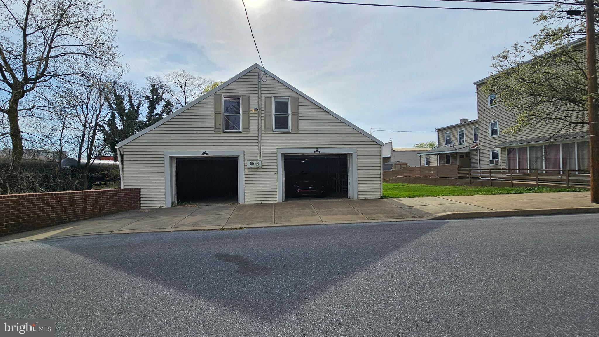 The large garage is perfect for the car lover. There is enough room to store 8 cars inside. The brick structure has withstood the test of time and is waiting for its new owner. Zoned conservation, with an existing non conforming use. With a little tlc, this could be a great place to keep your auto treasures.