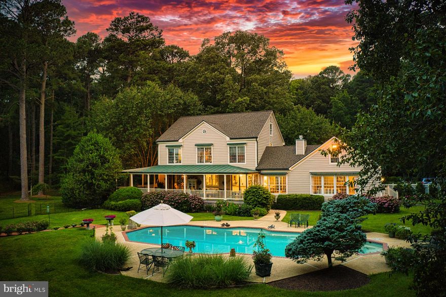 Quintessential Eastern Shore getaway on a private lot with mature trees and landscaping. This 3 bedroom home offers casual lifestyle while elegant interior.
Formal dining room, living room, gourmet kitchen with La Cornue gas stove, huge island to host crowds, double sided fireplace , sitting room off the kitchen and much more.
Fabulous porch over the whole length  of the home on the waterside offer an outdoor living space and dining area. Waterside pool with spa, a dock with 4 MLW.
Included is an adjoining 5+ ac lot with its own driveway.