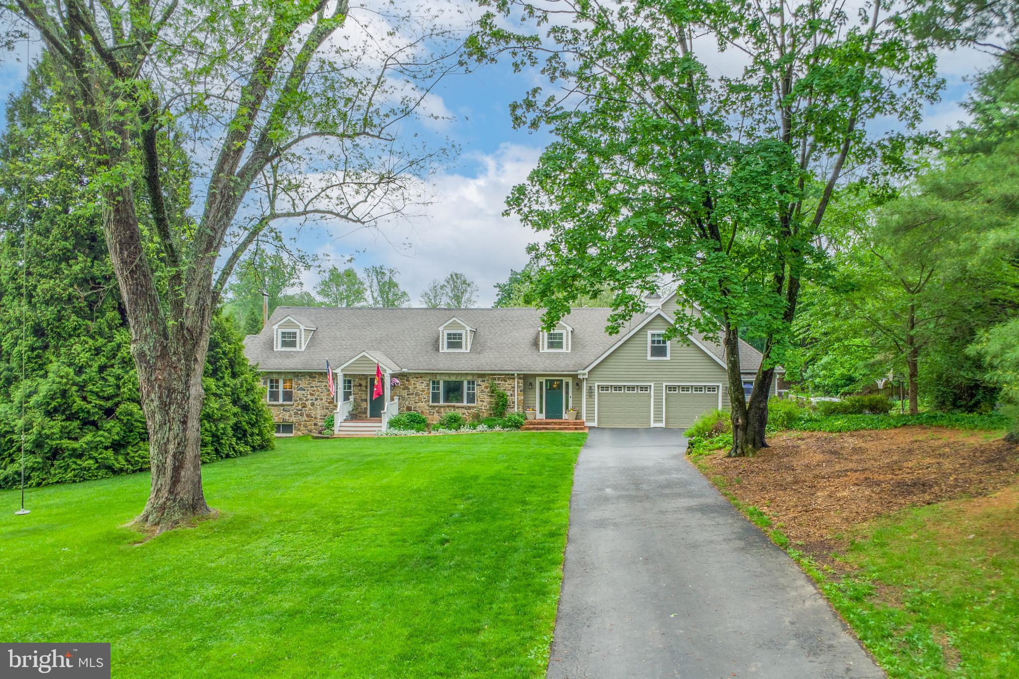 Multigenerational Flexibility Meets Classic Charm – With a Full In-Law Suite
Welcome to 90 Indiantown Road — a rare opportunity to own a spacious 6-bedroom, 4-bath Cape Cod-style home on 1.4 beautifully landscaped acres in desirable Glenmoore. Perfect for multigenerational living or flexible family needs, this home features a private, fully outfitted, ADA compliant in-law suite with a separate entrance, full kitchen, living area, and radiant heated floors — ideal for extended family, or guests.
Inside, you'll find a blend of comfort and style: a welcoming foyer, formal dining room with hardwood floors, and a bright kitchen with stainless steel appliances, peninsula breakfast bar, recessed lighting, and a generous walk-in pantry. Entertain effortlessly from the adjacent wet bar or unwind in the sunny living room with hardwood floors. The main-level primary suite is a private retreat, complete with a semi-vaulted ceiling, sitting area, double vanity bath, soaking tub, tiled walk-in shower, and a large dressing room with walk-in closet. A dedicated guest bath and laundry room round out the first floor, while the in-law suite shines as a self-contained space: radiant-heated cherry floors, skylit living room, full kitchen with gas stove and dishwasher, private bedroom, full bath, and access to two additional upstairs bedrooms — perfect for guests, work-from-home setups, or independent family members. Upstairs in the main house, you'll find two more bedrooms, a full bath with a walk-in shower, a large hall closet, and a flexible bonus space. The walk-out lower level offers a massive unfinished basement — ready to be transformed into a gym, rec room, or workshop — and houses upgraded utility systems including zoned central A/C, radiant heating, and a 24 kW whole-house generator powered by a 1,000-gallon buried propane tank. Outside, enjoy a private oasis: patio, firepit, garden beds, mature trees, sheds, a chicken coop, and expansive lawn — perfect for outdoor entertaining or quiet evenings under the stars. Located in the award-winning Downingtown School District, just 8 miles from Downingtown West and close to I-76, this home offers privacy, versatility, and long-term value in a scenic Chester County setting. Homes with true in-law suites rarely come available — don’t miss this exceptional opportunity. Schedule your private tour today!