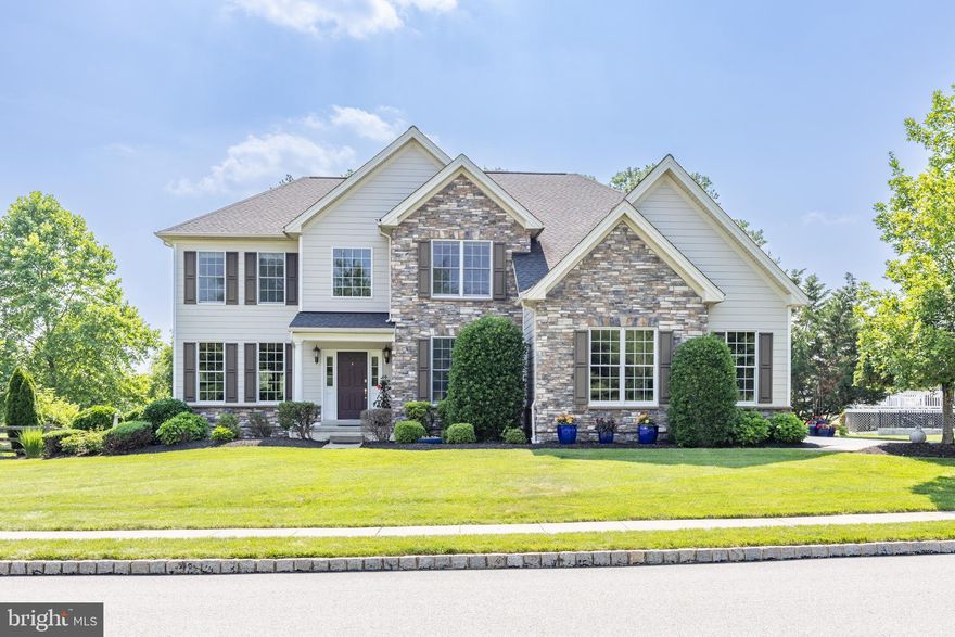 Welcome to this beautiful East-facing home in the desirable Reserve at Eagle community, located in the award-winning Downingtown School District. This spacious and well-maintained property offers a perfect blend of comfort and style, featuring a combined formal living and dining room, private office, and a gourmet eat-in kitchen with brand-new appliances that opens to a dramatic two-story family room with a stunning stone fireplace! First-floor laundry, a 3-car garage, and a powder room complete the main level.
Upstairs you'll find four generously sized bedrooms, including a luxurious primary suite with a custom walk-in closet and a spa-inspired bath with a double vanity and dual shower heads. A Jack-and-Jill bath serves two additional bedrooms, while the fourth bedroom features its own ensuite bath. 
The full unfinished walk-out basement spans the entire footprint of the home and offers endless potential for future living space. Step outside to your own private backyard oasis—complete with a peaceful patio, soothing hot tub, and lush surroundings that provide both beauty and privacy. This is a rare opportunity to enjoy both luxury and tranquility in the heart of Chester Springs. Don’t miss it!