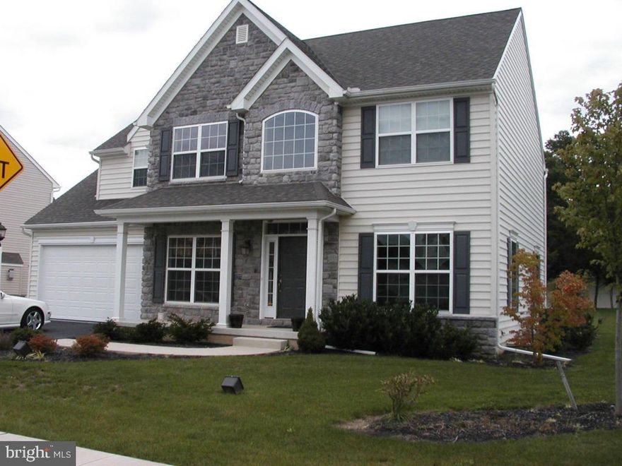 Former model home!  2800 square feet + 600 square feet of finished basement.  4 bedroom, 2.5 bath, LR, DR, & 1st floor office.  Eat-in kitchen with granite tops & stainless appliances.  Hardwood floors and FR which has vaulted ceilings & a fireplace.  Owner suite includes tile bath with Jacuzzi tub.  Home also has sound system & security system.  Gas heat.  W/D & fridge included.  Available mid-September.