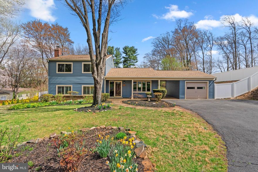 OPEN HOUSE SATURDAY (1-3PM) & SUNDAY (1-3PM)!!! Welcome to this beautifully updated home, blending mid-century modern charm with modern upgrades. Nestled in a serene, friendly neighborhood, this home offers a peaceful, secluded oasis while being close to all the conveniences of everyday life. As you enter, you're greeted by a bright, airy entryway with tall vaulted ceilings that create a sense of openness throughout the main floor. The spacious, open design is perfect for family living and entertaining, with plenty of natural light flooding the rooms. The living room flows effortlessly into the dining area, and the large sliding doors lead to a huge, fenced-in backyard, providing seamless indoor-outdoor living. Beautiful engineered hardwood floors throughout the main floor add warmth and elegance to the space. Step into the heart of this home, where the kitchen will inspire your inner chef! With an abundance of storage, including tall upper cabinets and a spacious pantry, you’ll have all the room you need for kitchen essentials and more. The expansive countertops are perfect for preparing meals, while the bright, airy breakfast nook offers a cozy spot for your morning coffee. Whether you’re cooking for a crowd or enjoying a quiet meal, this kitchen is both functional and fabulous! Head down to the lower level, where you'll find a second living room featuring a stunning exposed brick fireplace wall, creating the ideal atmosphere for cozy nights in or lively gatherings. This level also includes a spacious bedroom and an updated full bathroom, perfect for guests or family members seeking a bit more privacy. A large unfinished storage area with laundry facilities and additional closet space provides plenty of room to organize and store your belongings. Upstairs, the home offers four bedrooms, each with large windows that invite in plenty of natural light. The primary bedroom boasts a walk-in closet and an updated, private full bathroom for your convenience.  A beautiful updated full bathroom in the hallway , and a handy linen closet provide additional storage space. The backyard is your own private paradise, designed for both relaxation and entertainment. Imagine hosting summer BBQs on the spacious patio, surrounded by lush landscaping that creates a tranquil, semi-private oasis. The fenced-in yard ensures privacy, while the storage shed offers a convenient spot for tools or outdoor gear. Whether you’re unwinding after a long day or gathering with friends and family, this expansive yard is the perfect backdrop for memorable moments. Other highlights of this home include updated siding on the exterior, ample closet space throughout, and a great open flow layout that makes for easy living. Whether you're hosting family and friends or enjoying quiet evenings, this home is a perfect fit for a variety of lifestyles. Located in a peaceful and friendly neighborhood, this home is the epitome of comfort, convenience, and style. Come make it yours and enjoy the perfect blend of modern amenities and mid-century charm!