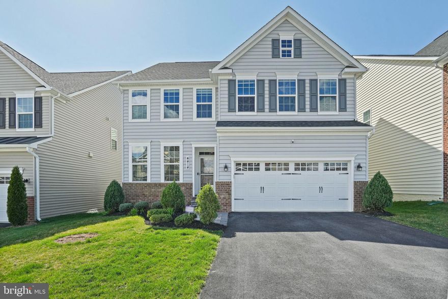 Rarely available, gorgeous 4 bedroom, 4.5 bath + office backing to wooded common area! Gleaming hardwood floors! Office on main! Custom chef's granite eat-in kitchen with island, gas cooking and a large pantry! Kitchen opens to family room with 5.1 speakers, gas fireplace which leads to private large composite deck! Upper level primary suite with sitting area, dual walk-in closets, separate vanities and a walk-in double head shower! Upper level laundry room with built-in cabinets! Finished walkout basement with full bath leading to beautiful rear paver patio with hot tub and fire pit! 2 car garage with EV charger connected to custom mud room! Call today for your private showing!