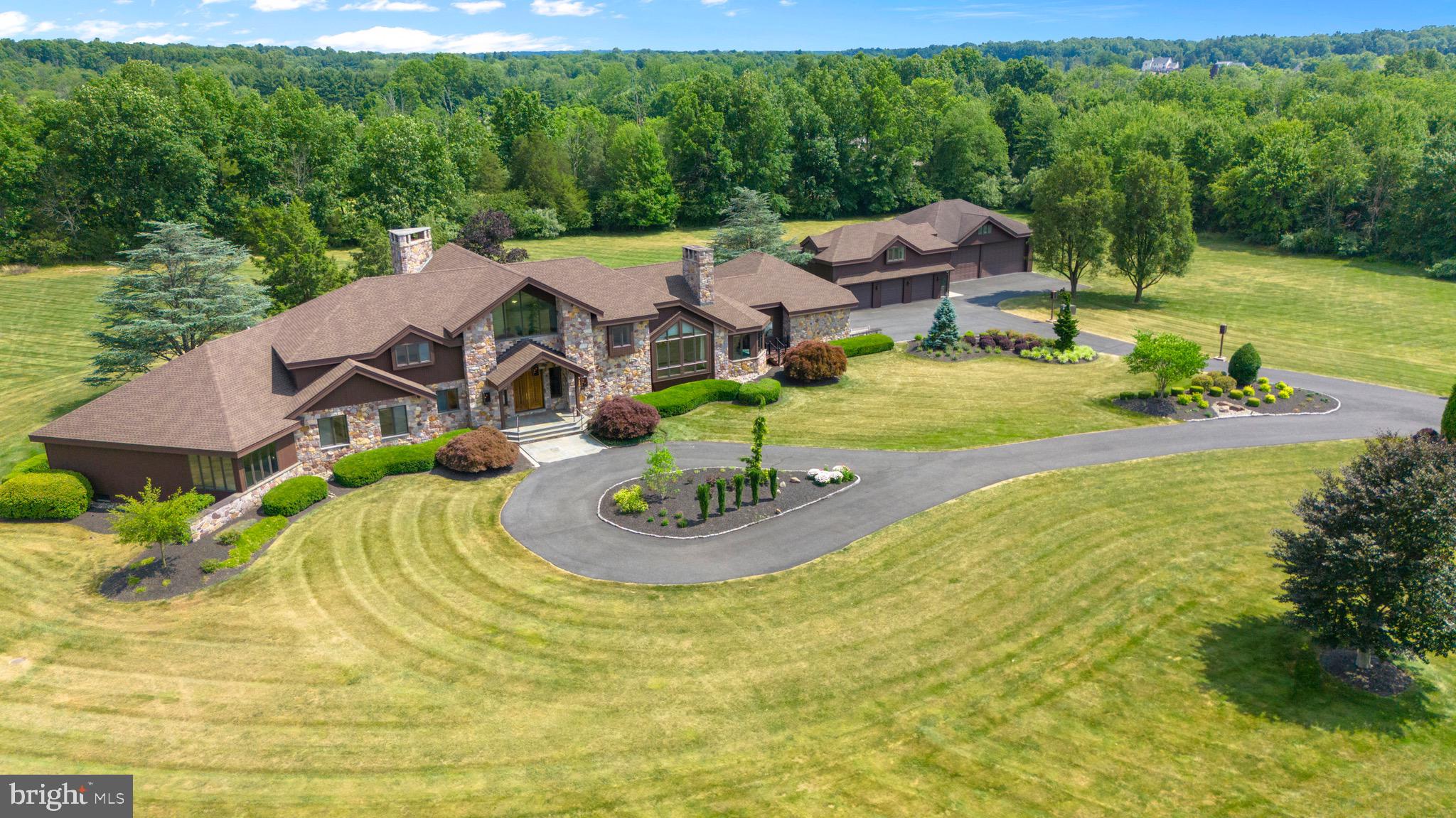 Belle Meade
An unparalleled opportunity nestled in the heart of rural Bucks County, PA—this stunning 15-acre property offers an exceptional blend of luxury, privacy, and unique amenities. This expansive estate boasts its own private airstrip, making it a haven for aviation enthusiasts seeking convenience and exclusivity.
As you enter the property, you are greeted by a picturesque scene—a tranquil pond and meandering stream, adorned with a charming bridge, adding to the property's serene ambiance. The centerpiece of the estate is a spacious 7,922 square foot residence, meticulously designed to offer both comfort and sophistication. Inside, discover grand living spaces, 4 bedrooms, 4.5 baths, and including a heated indoor spa, perfect for year-round relaxation and entertainment.
For the discerning buyer, additional features abound, such as a secure airplane hangar ensuring the utmost convenience for aviation-related activities. A detached 3-car garage with an accompanying 1,144 sqft apartment provides ample space for guests or staff.
This property represents a rare opportunity to own a piece of Bucks County's rural beauty while enjoying the luxury of unique amenities designed to cater to the most refined tastes. Whether you are drawn to the tranquil surroundings, the convenience of private aviation facilities, or the allure of a spacious estate, this listing promises a lifestyle of unparalleled elegance and comfort.