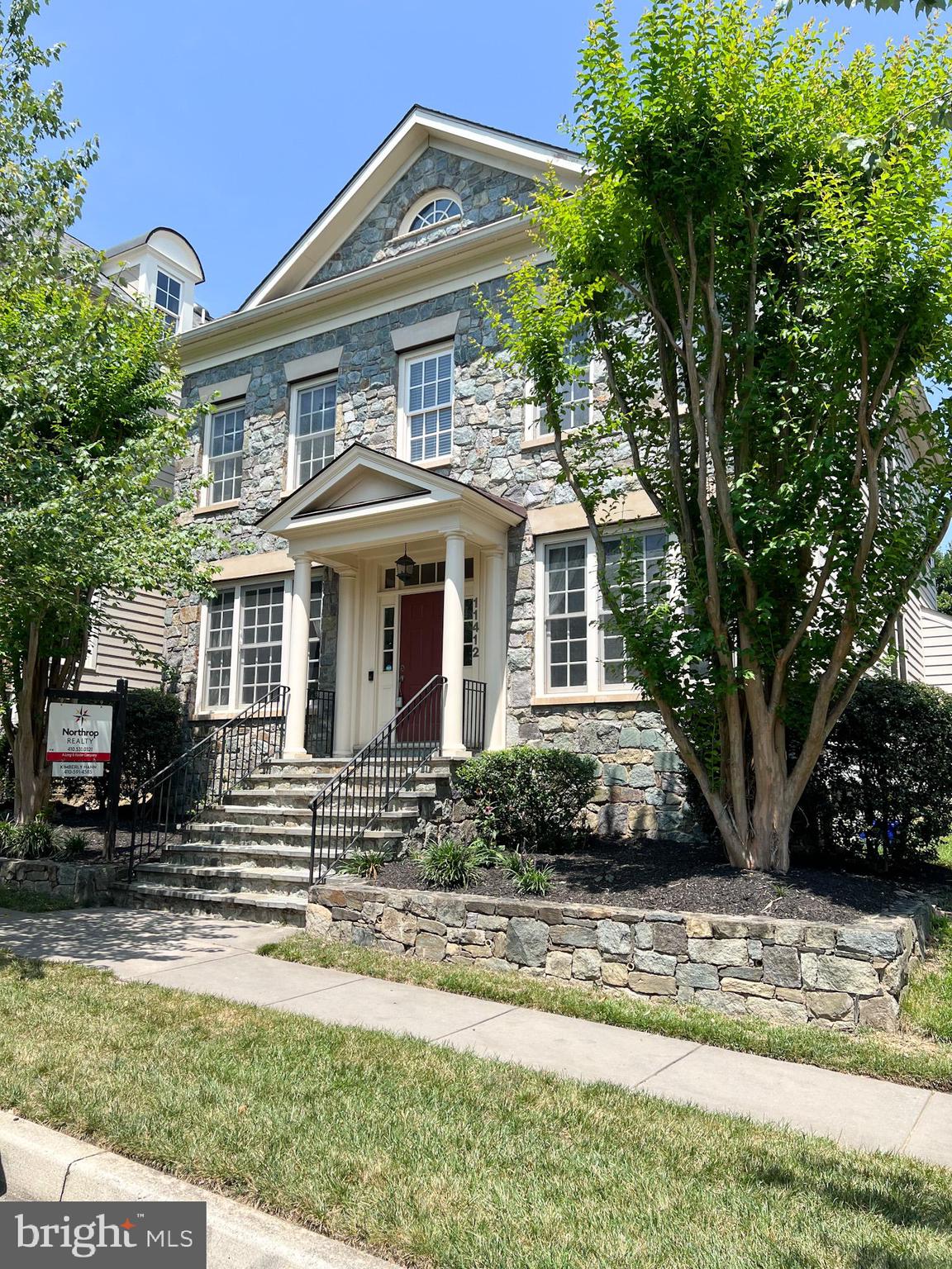 In the Moving Process. Showing appointment, 24 hour notice required. Selling As Is. Prestigious living in Maple Lawn Midtown, the heart of Maple Lawn! This beautiful home features 10-foot ceilings on the main level, an oversized two-car garage, and stunning hardwood floors throughout. The spacious kitchen is a chef's dream with maple cabinetry, granite countertops, a large center island, and a bright breakfast area. The fully finished basement offers exceptional additional living space, complete with a home theatre, wet bar, fifth bedroom, full bath and a generous recreation room, perfect for entertaining. A main-level office provides the ideal work-from-home setup. Enjoy outdoor living with a private patio and fenced, flat backyard. Amazing HOA amenities including a outdoor swimming pool, gyms, tennis courts, many more. All of this in a vibrant community with Harris Teeter, restaurants, boutique shops and medical offices just moments away.