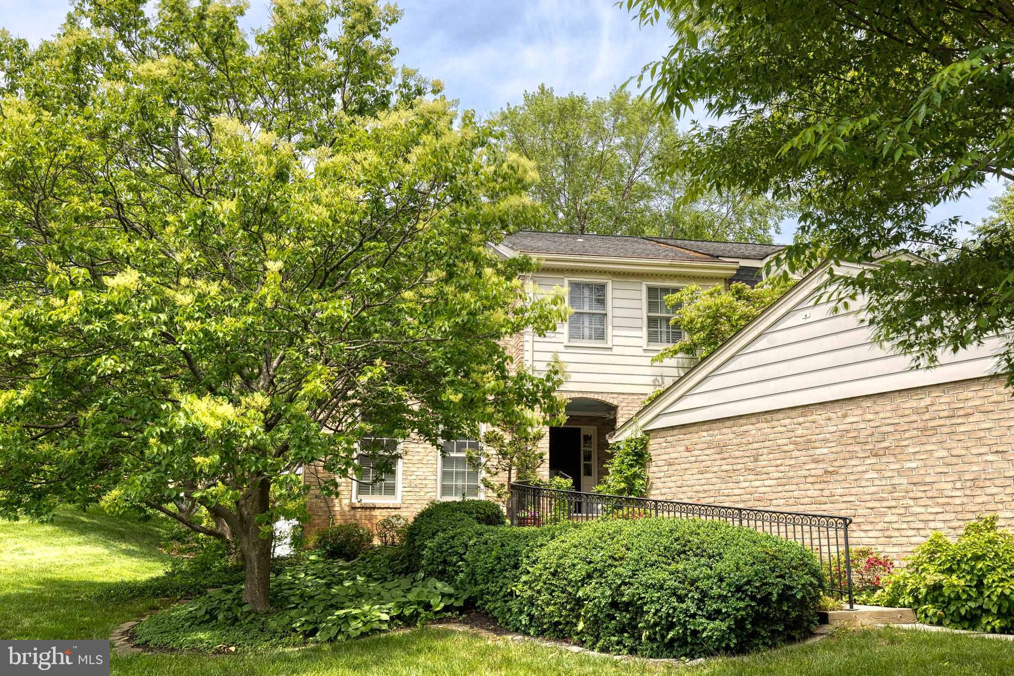 Exceptional Properties. Exceptional Clients. Welcome home to this picture perfect, move-in ready and rarely available end of group townhome featuring 3 bedrooms 3 and half baths with thoughtful details at every turn. Walk up the bluestone paved pathway alongside your spacious garage, lined with blooming flowers and a custom wrought iron railing and be greeted by a serene fish pond and private front porch. A true oasis welcomes you at your front door, this is the perfect spot to enjoy your morning coffee or a relaxing beverage. Step inside to a charming and newly renovated home with sophisticated hand-painted floors in the foyer and gleaming hardwood floors throughout. Custom millwork and crown moulding add architectural detail to the home and plantation shutters offer privacy while still allowing the sunlight to stream in. The open-concept kitchen boasts brand-new stainless steel appliances, a butcher's block island, gas cooktop and a cozy sitting area that flows seamlessly to the spacious dining and living spaces. A beautiful hearth anchors the living room featuring a wood-burning fireplace (with gas connector) and large floor to ceiling windows with natural light pouring in. The dining room offers multiple seating options with a nearby bar top and stools and room for a large dining room table.
Open the large sliding glass doors off the dining room and step outside to the custom deck featuring elegant Chippendale railings with steps down to a brick herringbone patio—perfect for outdoor entertaining. With expansive gardens, mature trees and open greens pace, the yard is a unique property in the neighborhood.
Climb the stairs to the second level, with a custom chippendale railing and designer runner and be greeted by three generously sized bedrooms and two beautifully appointed baths. The luxurious primary suite offers a private sitting area with a custom wool rug and a walk in closet equipped with a convenient in-suite laundry. The two additional bedrooms have custom wall to wall carpeting, generous closets, and plantation shutters for privacy.Â
The spacious lower level offers incredible flexibility with a handsome finished clubroom and entertainment area with custom built-ins, a large art studio, a second laundry area and thoughtful storage closets throughout. With a third full bathroom in the basement, there is plenty of space to create an additional bedroom if desired.
This meticulously cared for home features a brand new dual zone HVAC (2024), roof (2020), and propane tank (2024) and tankless hot water heater. The single-car garage has plenty of storage space equipped with built-in cabinetry and shelving. Enjoy the community pool, tennis and pickleball courts with an unusually low HOA ($280/month) in this centrally located Baltimore county with easy access to downtown. Don’t miss this rarely available end of group in Charlesbrooke!